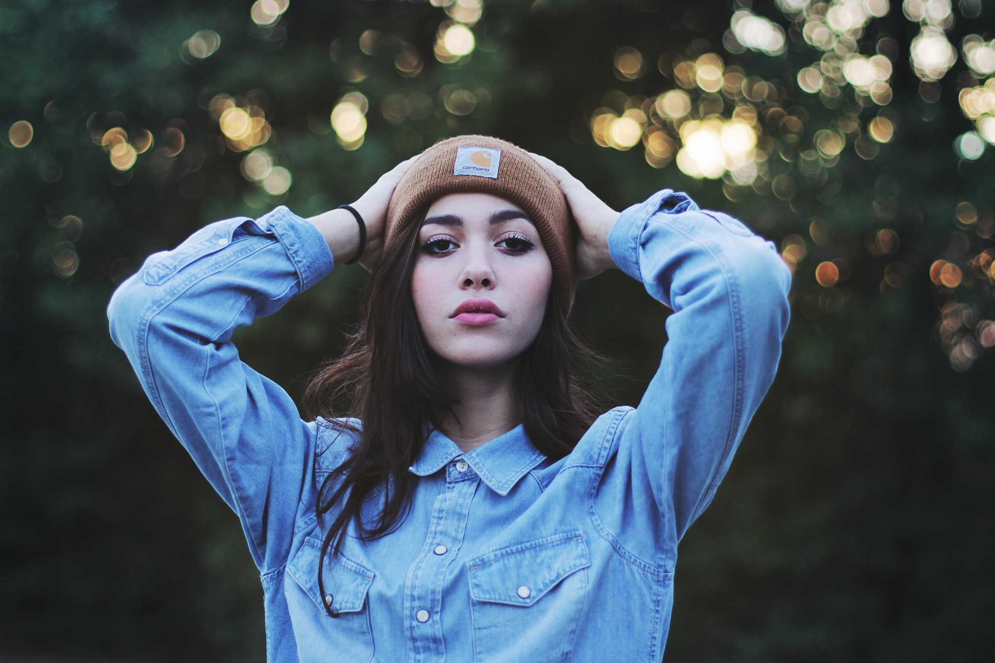 Woman wearing a beanie and denim shirt HD Wallpaper