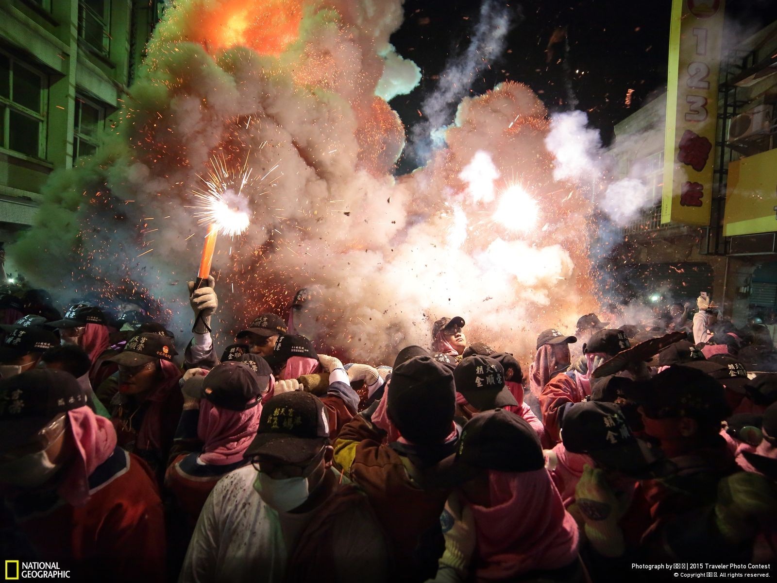 Crowd celebrating with fireworks HD Wallpaper