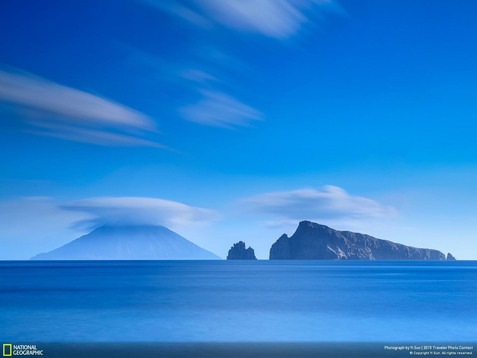 Islands and clouds over the sea HD Wallpaper