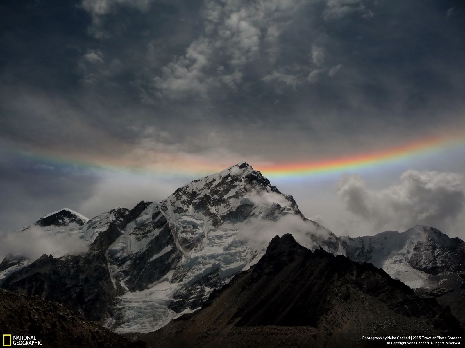 Rainbow over snow-capped mountains HD Wallpaper
