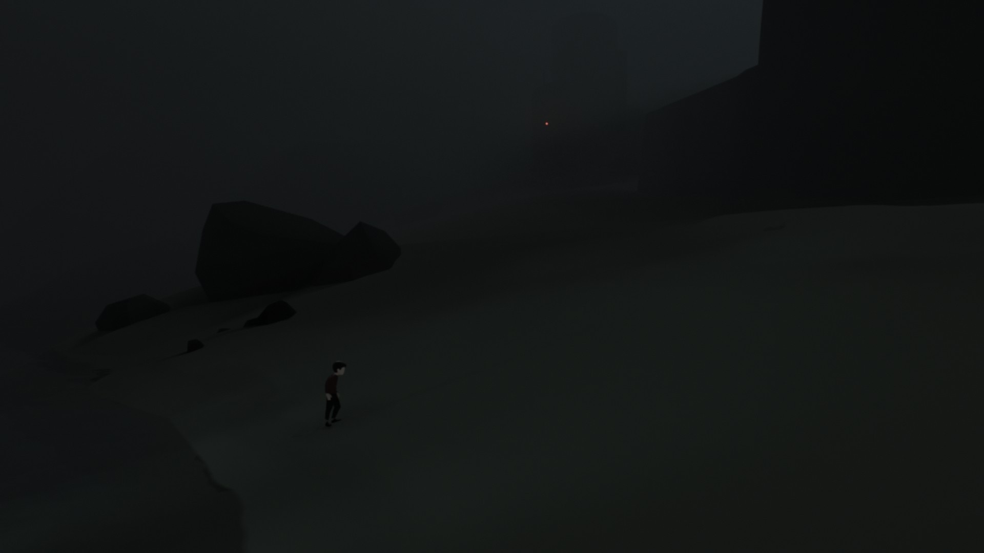 Boy in dark foggy landscape with rocks HD Wallpaper