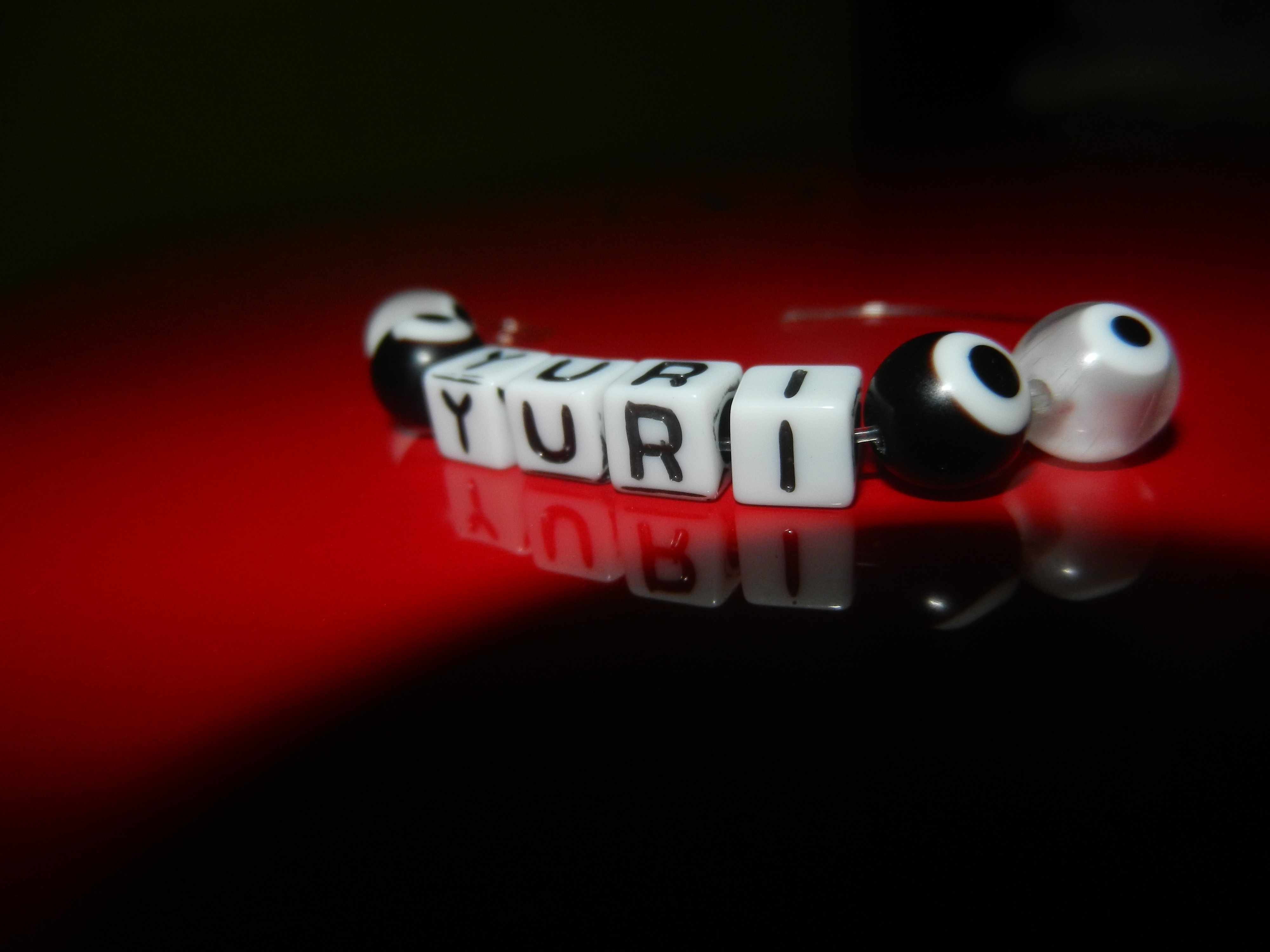 Bracelet with letters YURI and eye beads HD Wallpaper