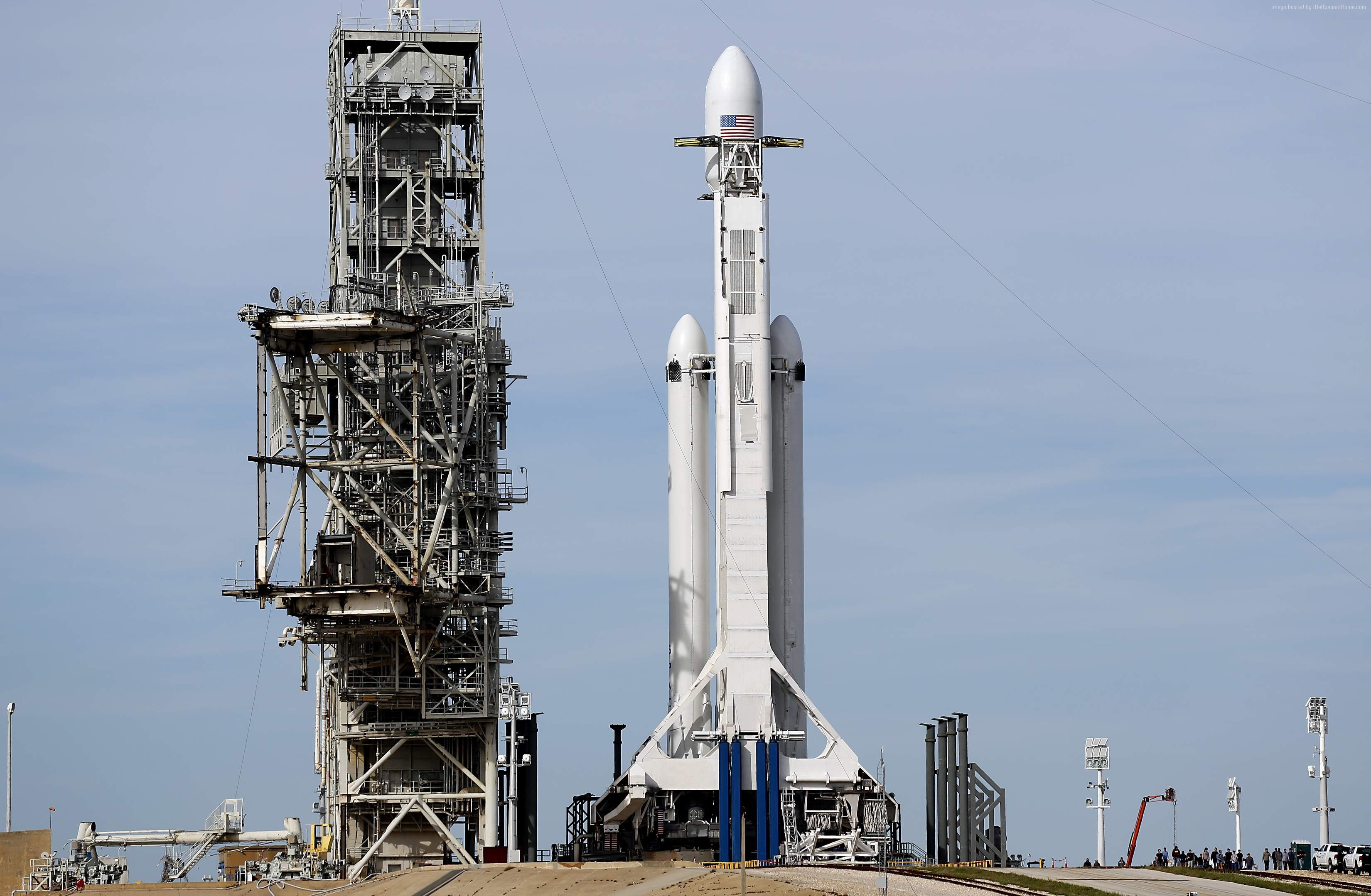 SpaceX Falcon Heavy rocket on launchpad HD Wallpaper