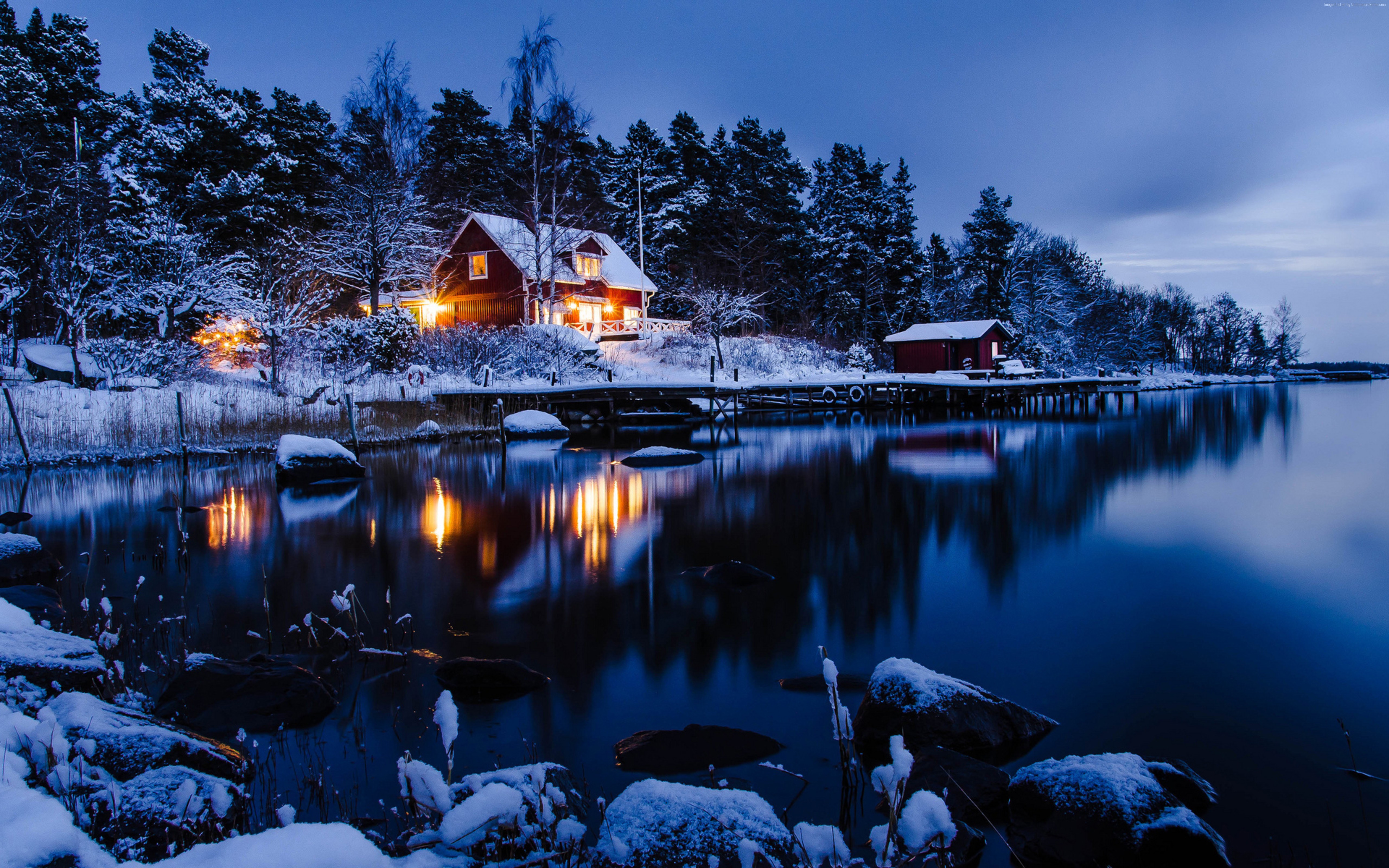 Winter house by a lake with snow-covered trees HD Wallpaper