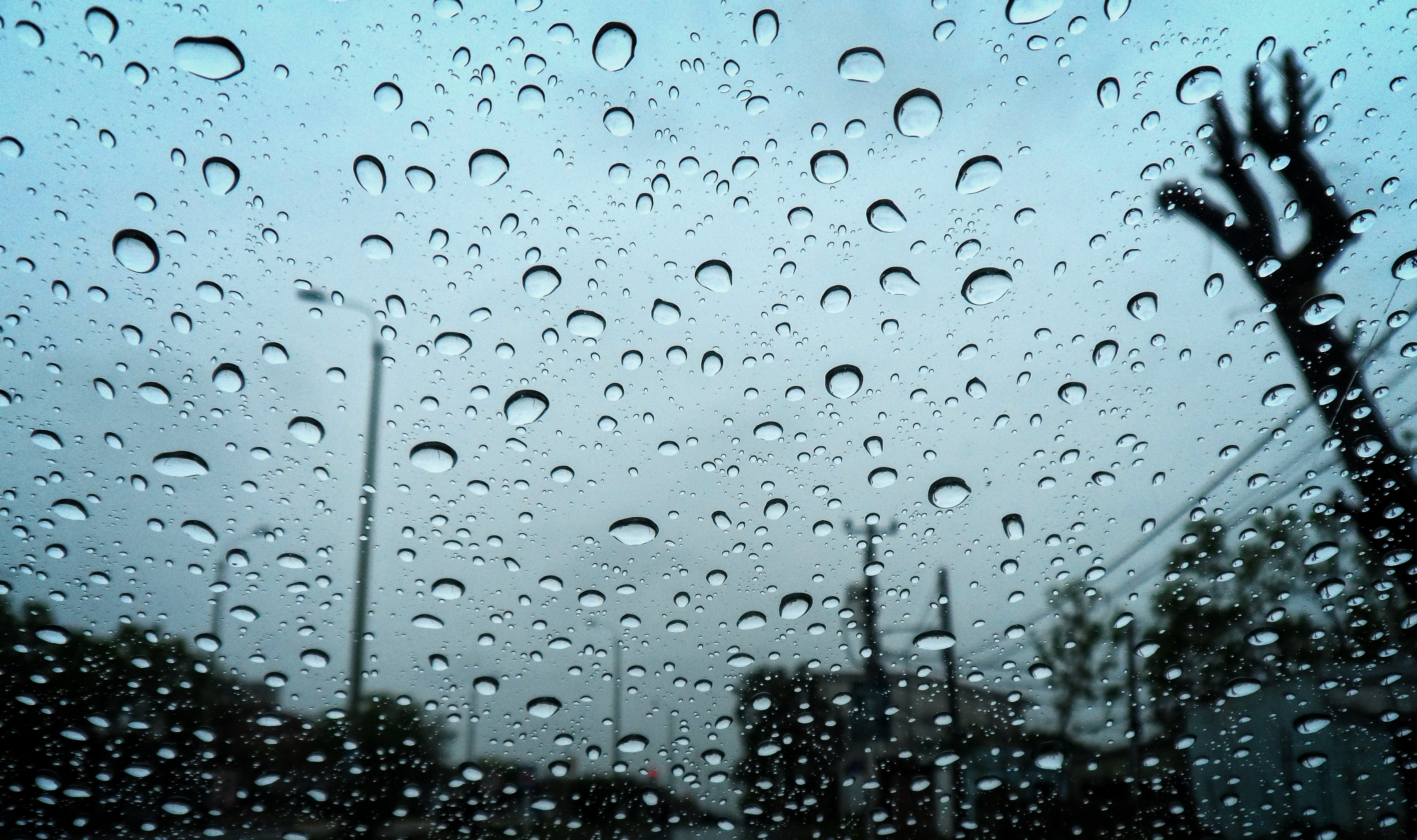 Raindrops on a windshield with power lines HD Wallpaper
