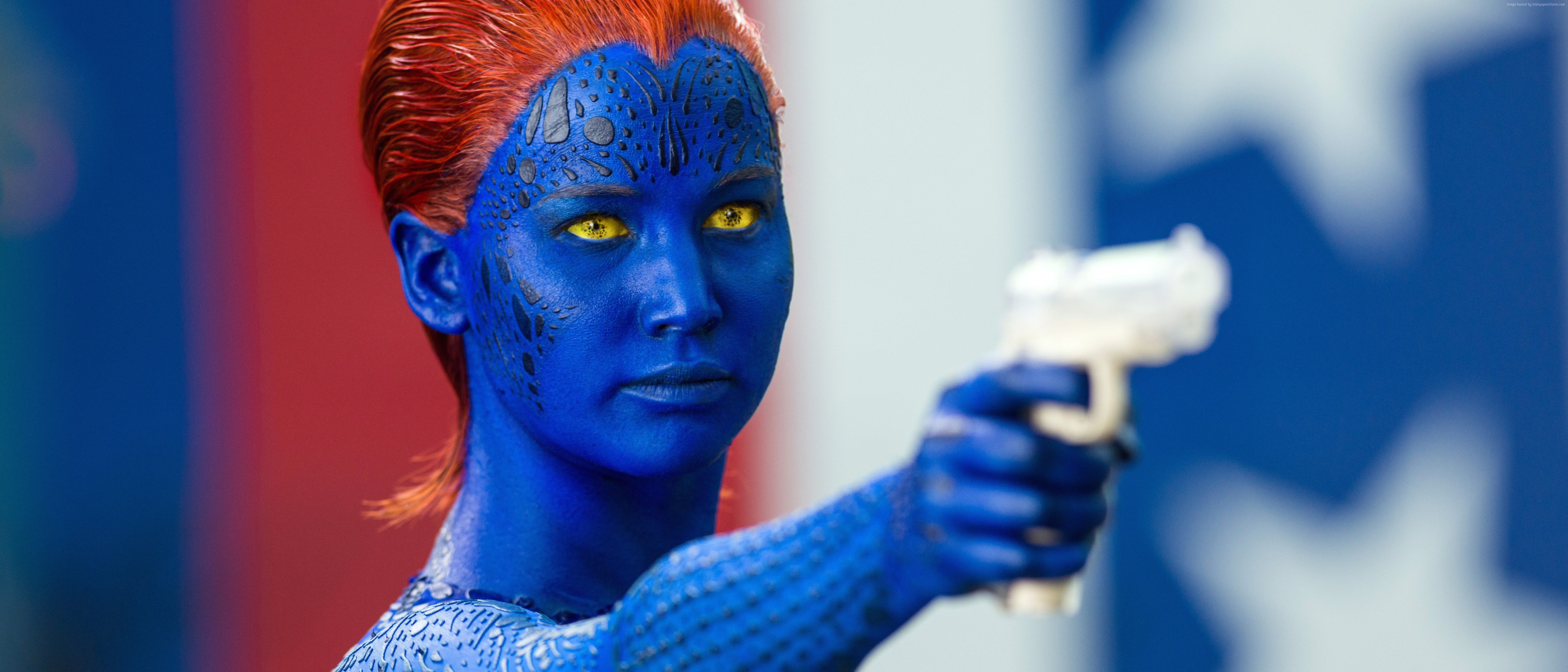 Mystique from X-Men holding a gun HD Wallpaper