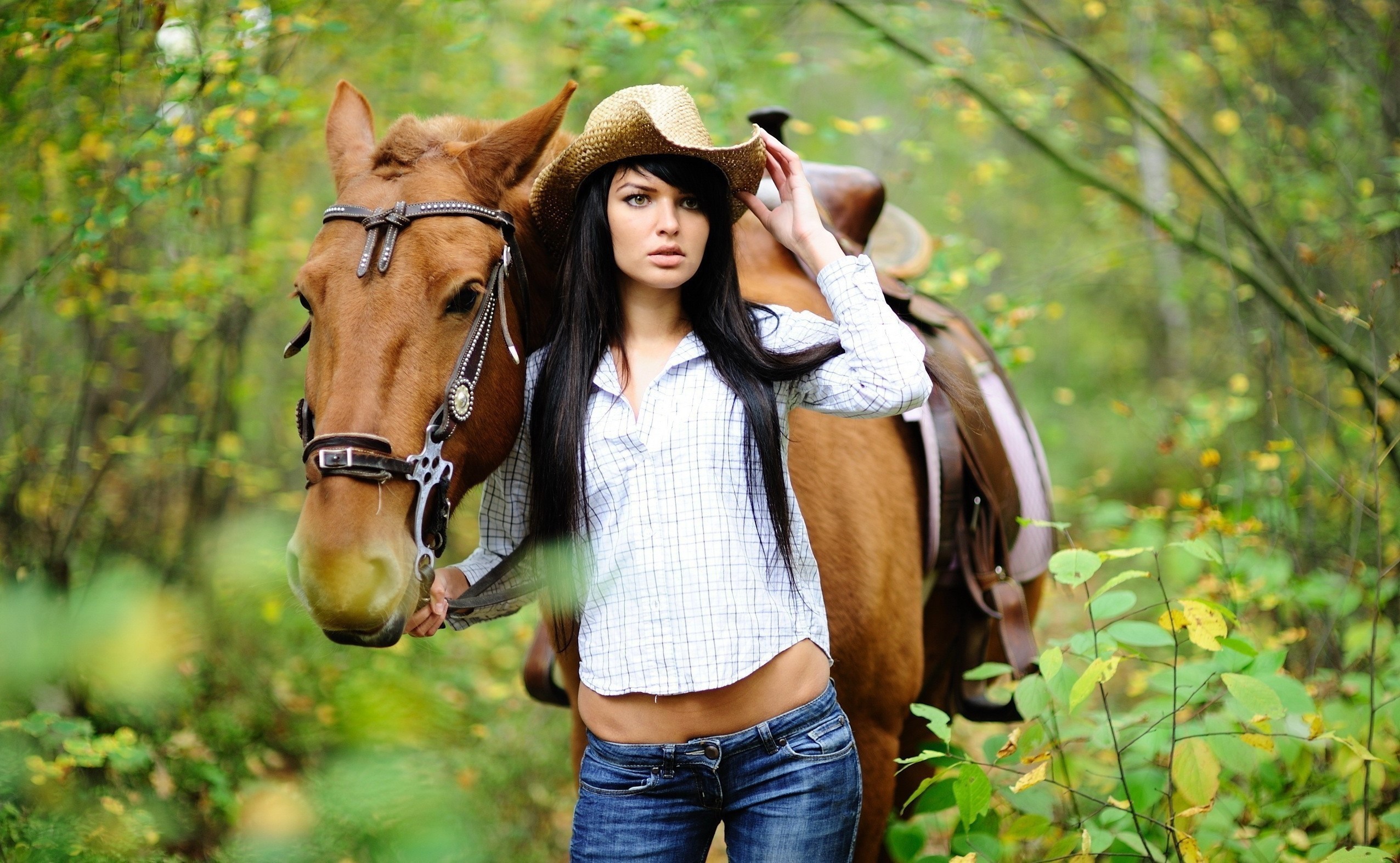 Woman in cowboy hat with horse in autumn forest HD Wallpaper