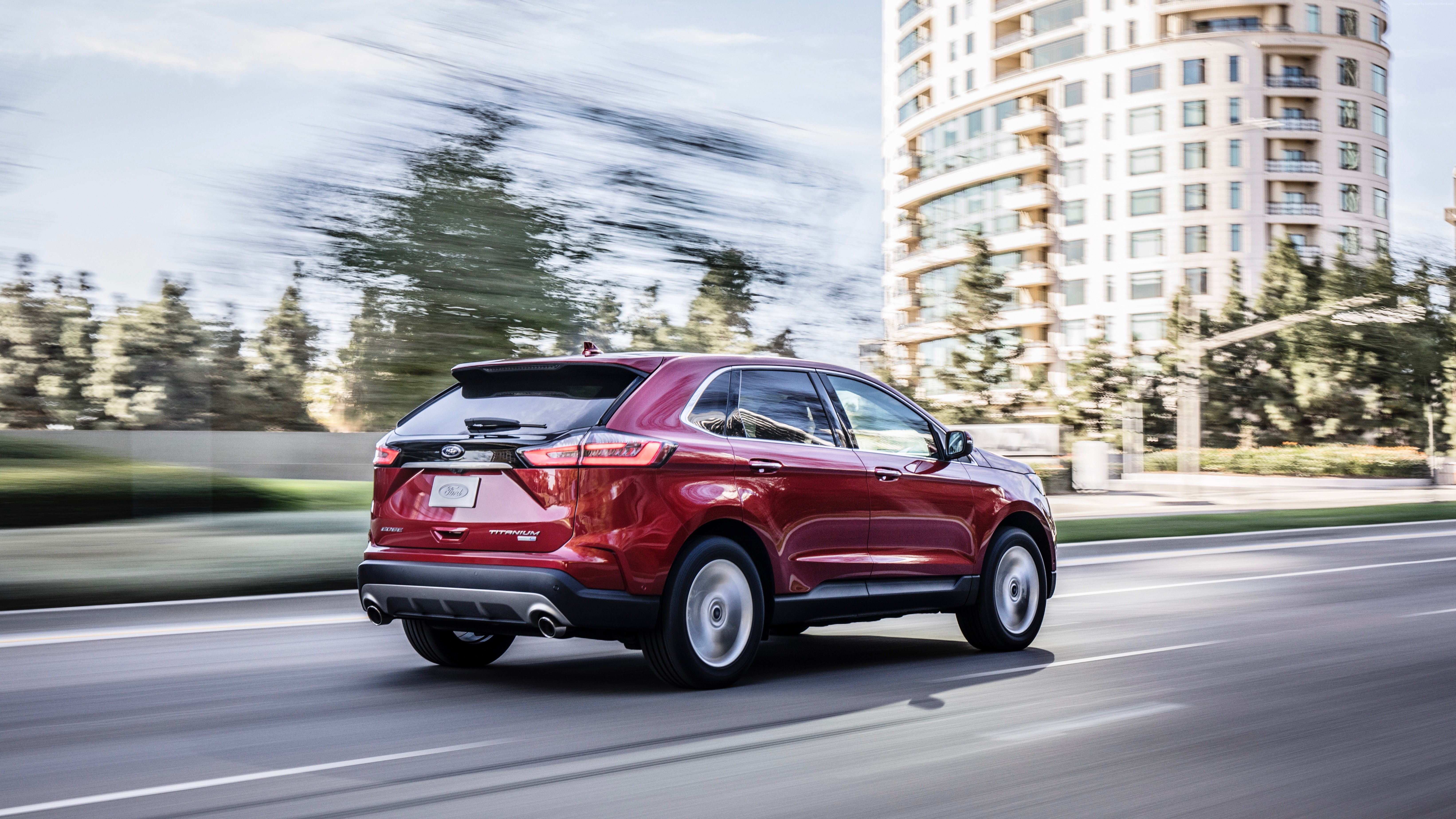 Red 2018 Ford Edge Titanium driving on a road HD Wallpaper