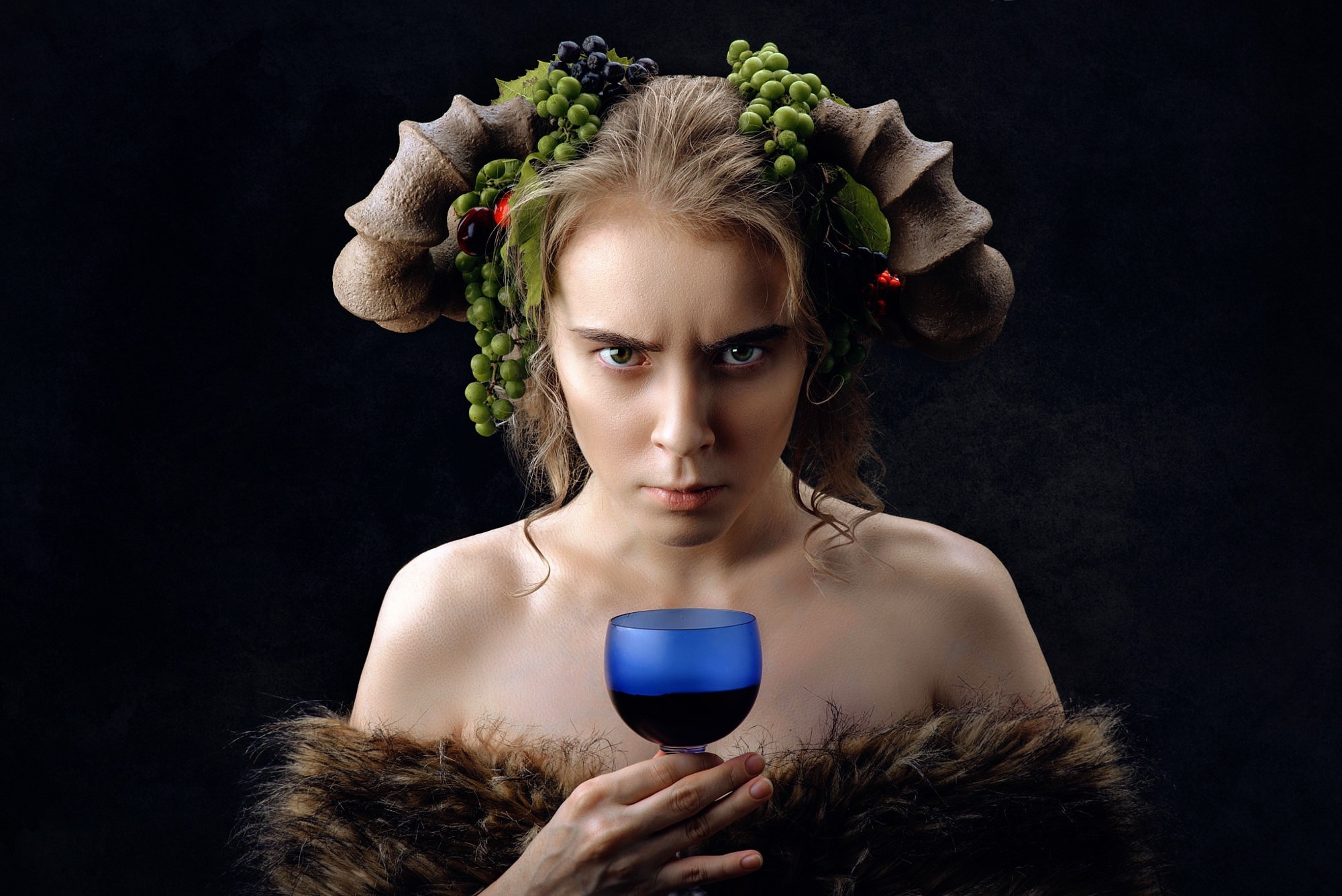 Woman with horns and grapes holding a glass of wine HD Wallpaper