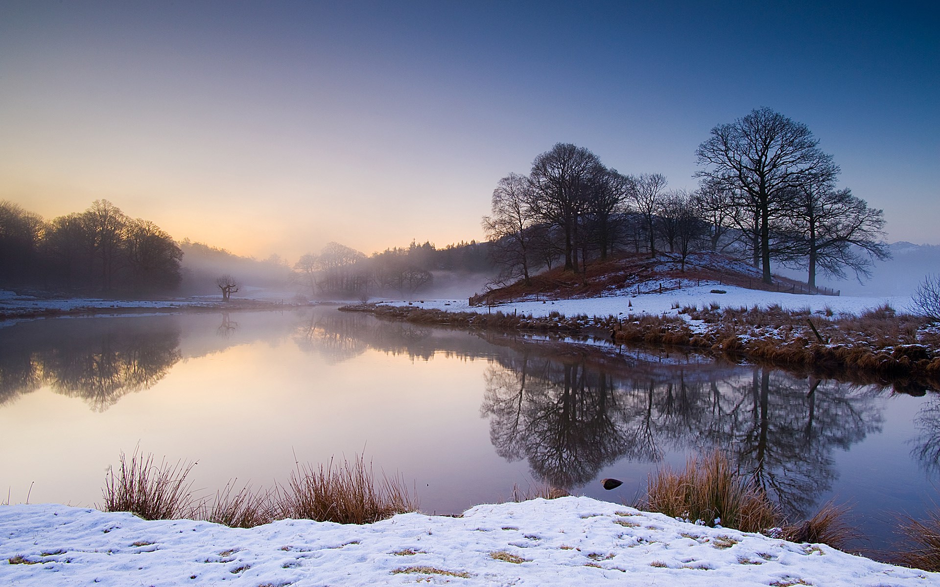 Winter lake at sunrise with mist and reflections HD Wallpaper