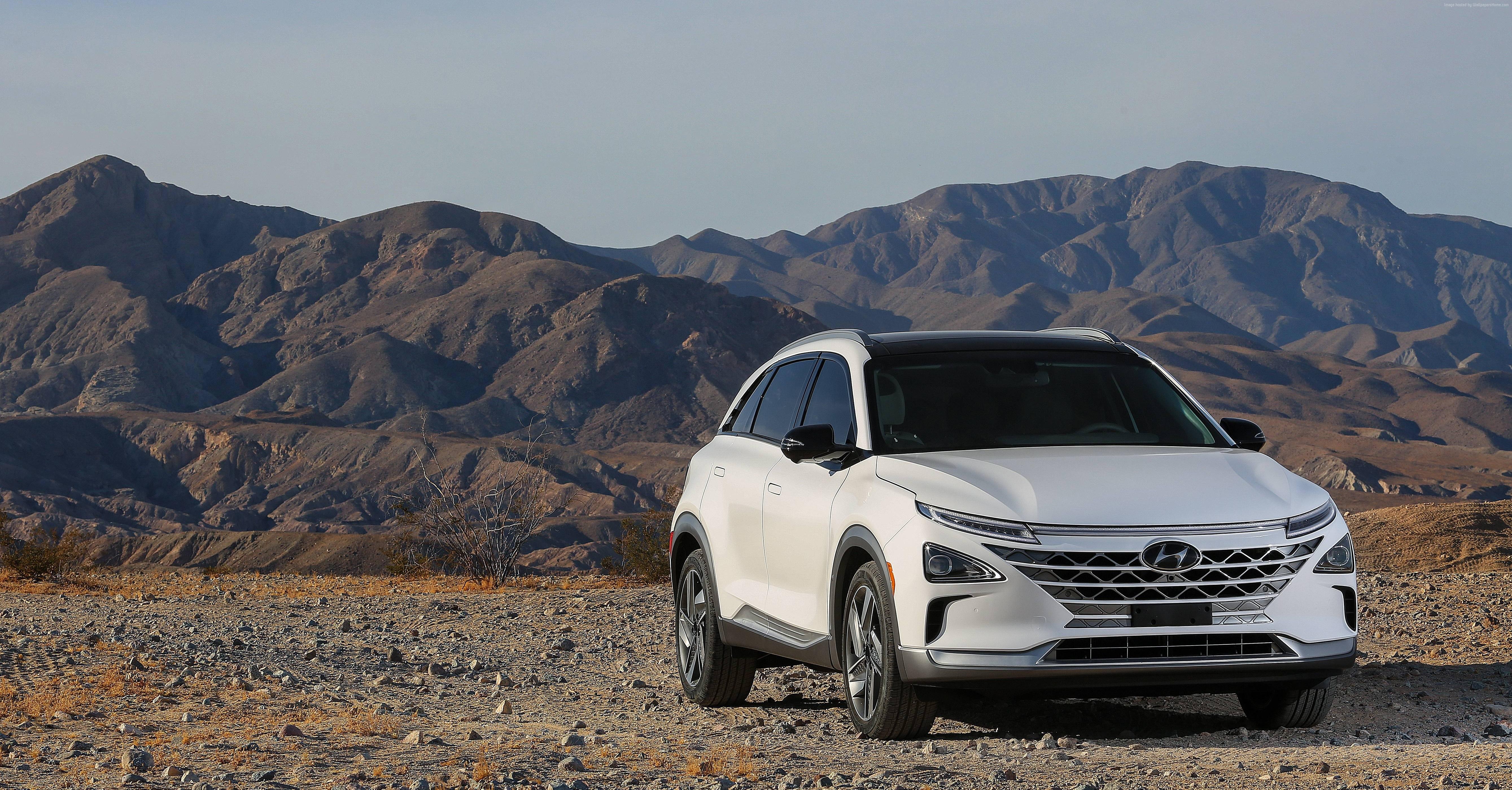 Hyundai Nexo SUV in a Mountainous Desert Landscape HD Wallpaper