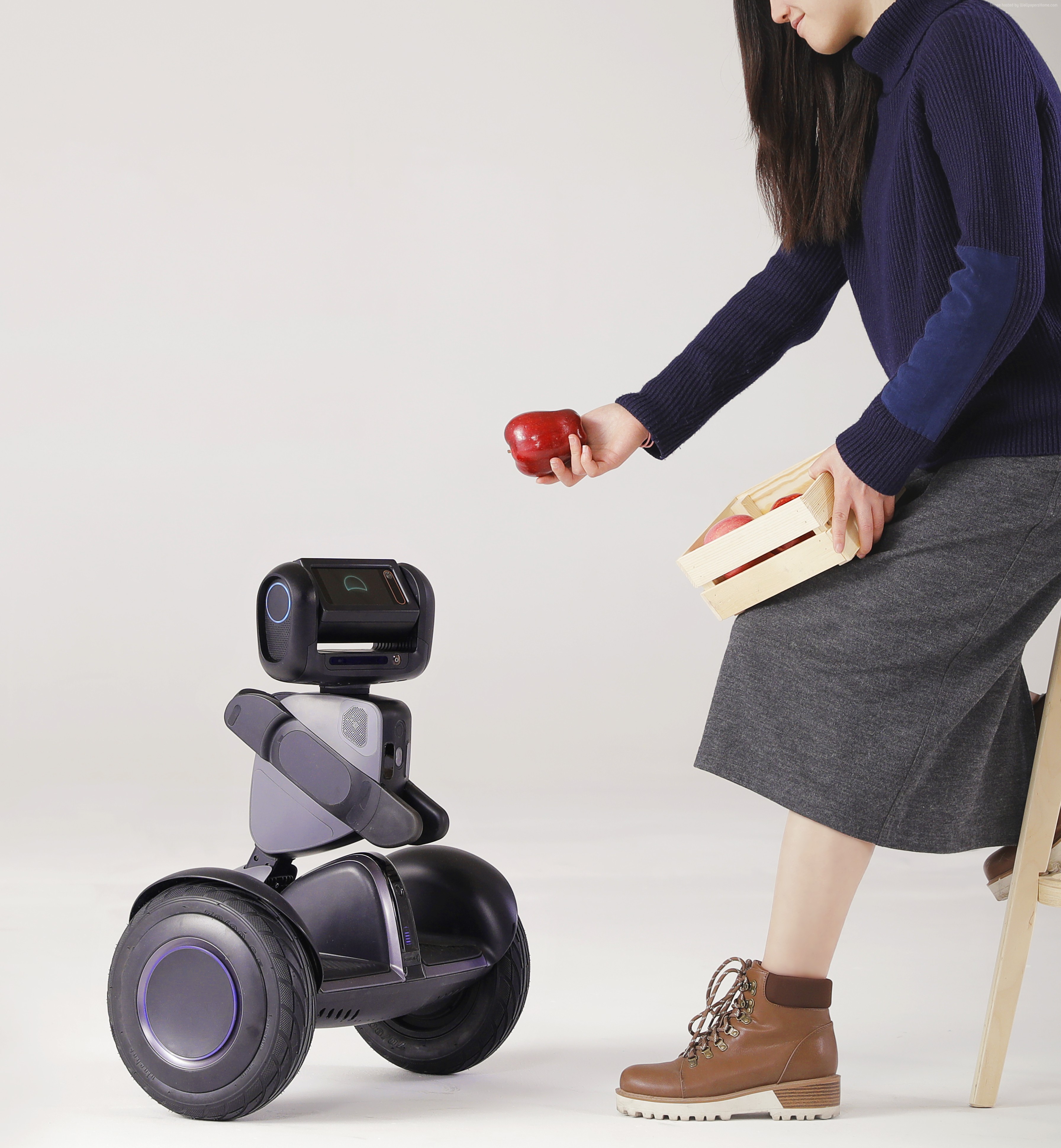 Segway Loomo robot with a person holding apples HD Wallpaper