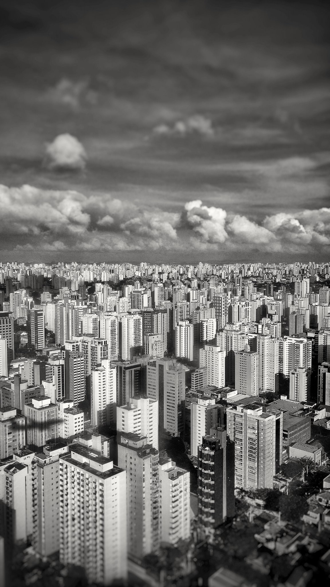 Monochrome cityscape of Sao Paulo, Brazil with skyscrapers and clouds HD Wallpaper