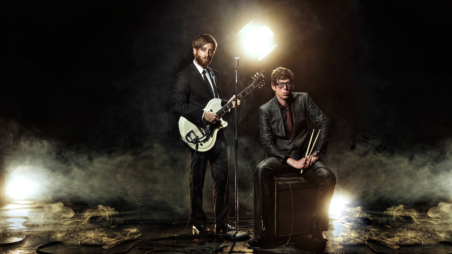 The Black Keys perform on a smoky stage HD Wallpaper
