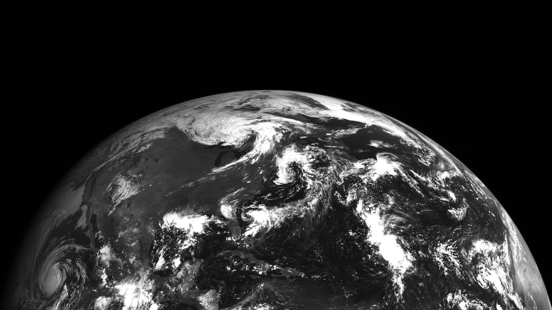 Earth from space, monochrome view of atmosphere and clouds HD Wallpaper