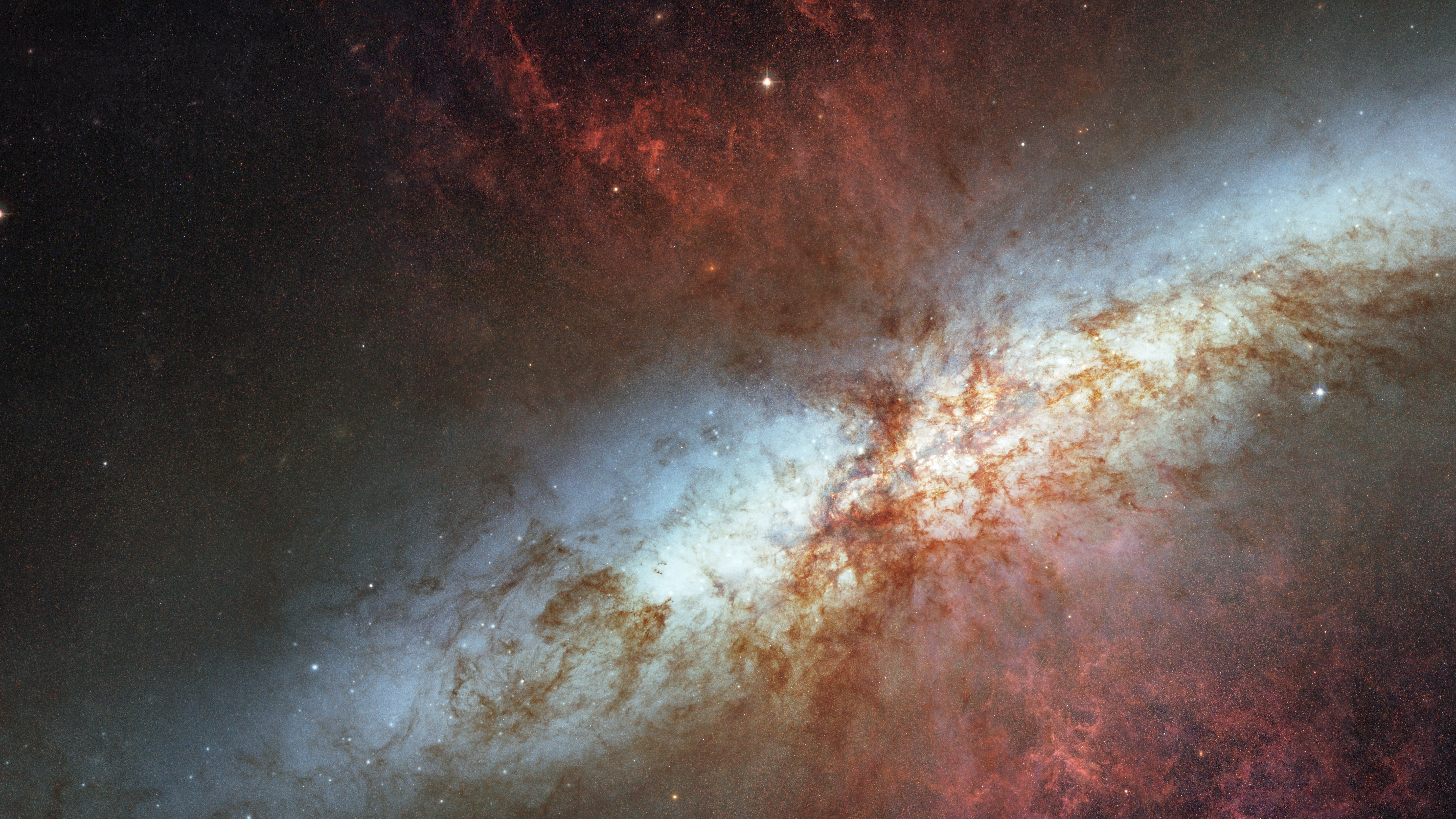 Messier 82 galaxy with nebula and stars HD Wallpaper