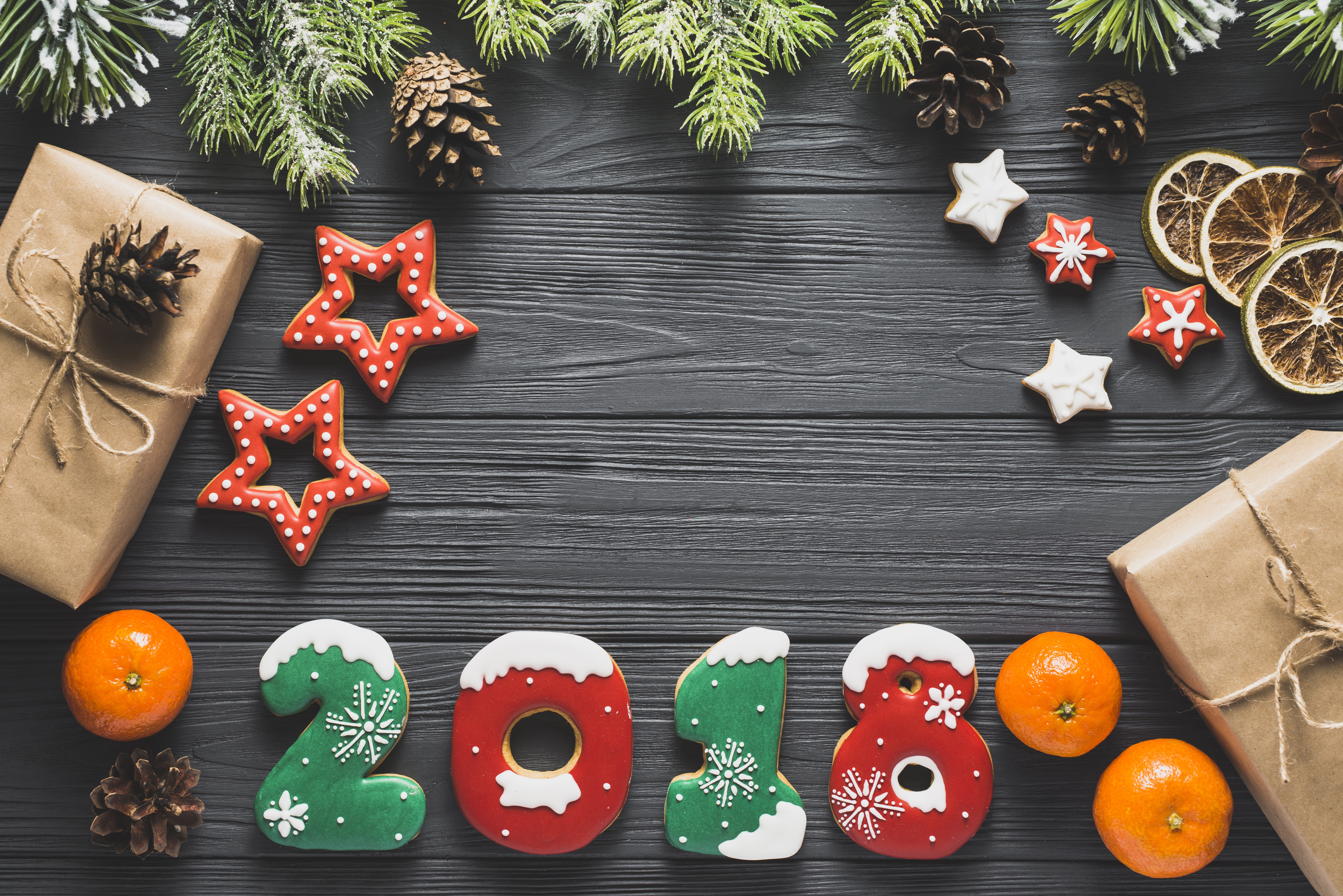 Christmas cookies in the shape of 2018, tangerines, and pine cones HD Wallpaper