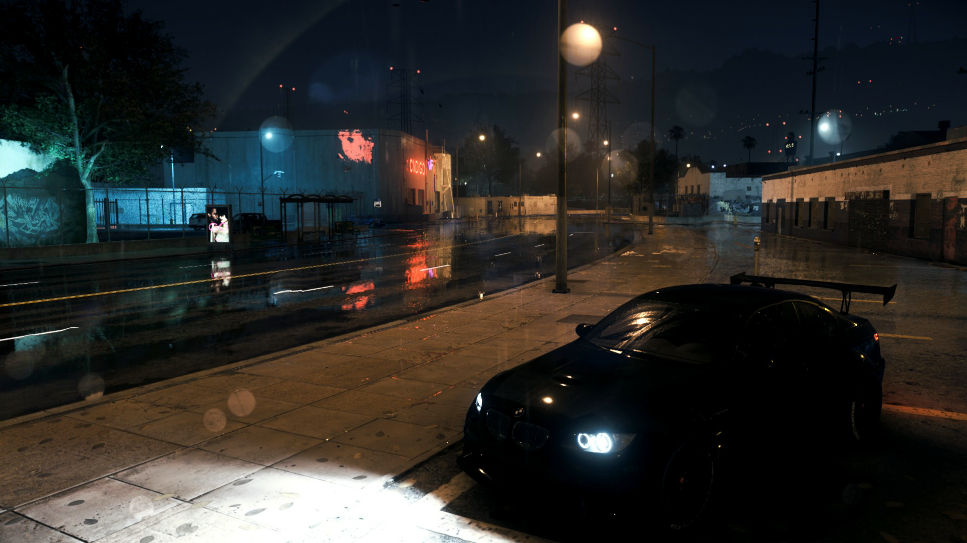 Black BMW M3 parked on a wet street at night HD Wallpaper