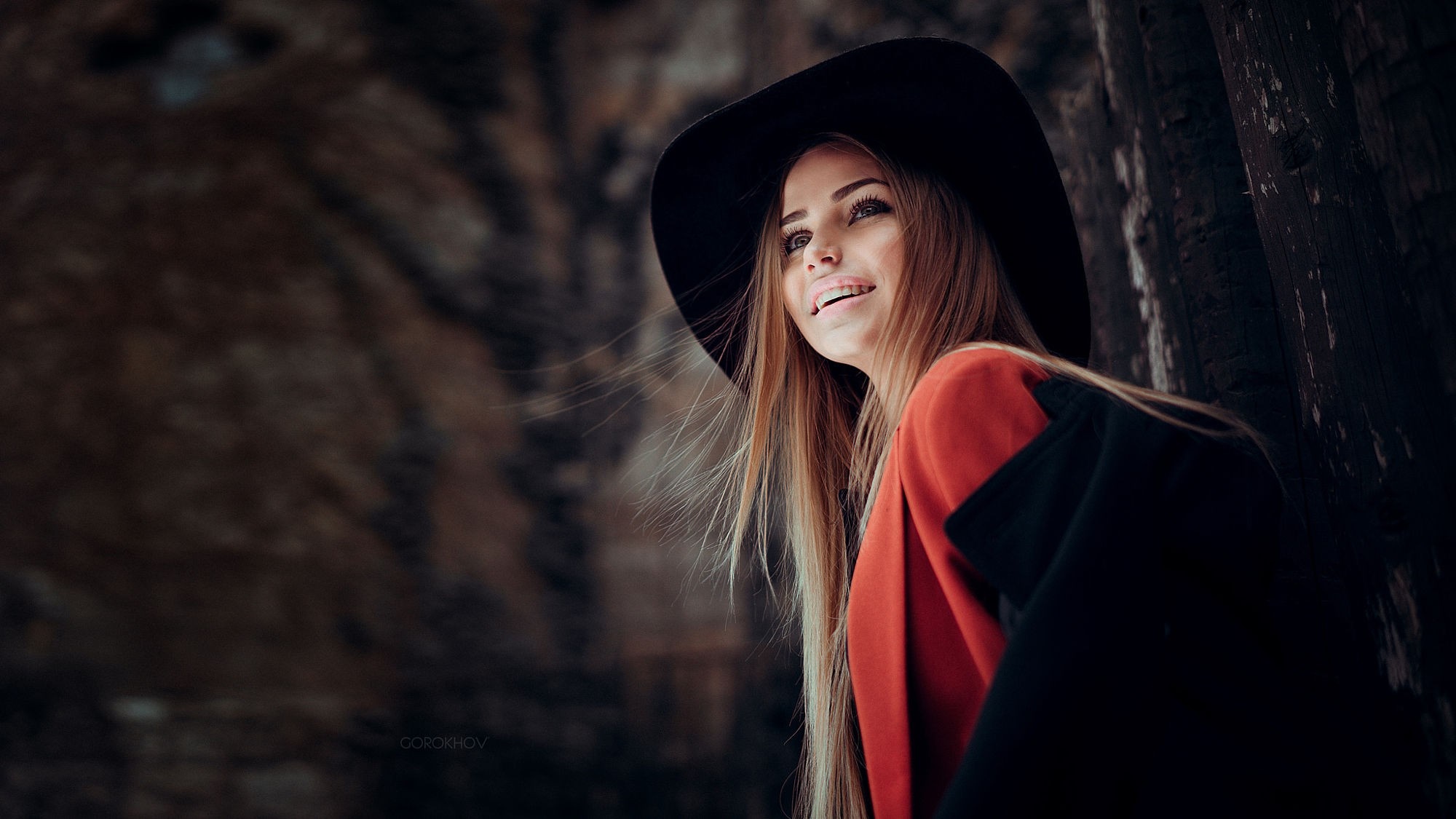 Woman in black hat and red jacket HD Wallpaper