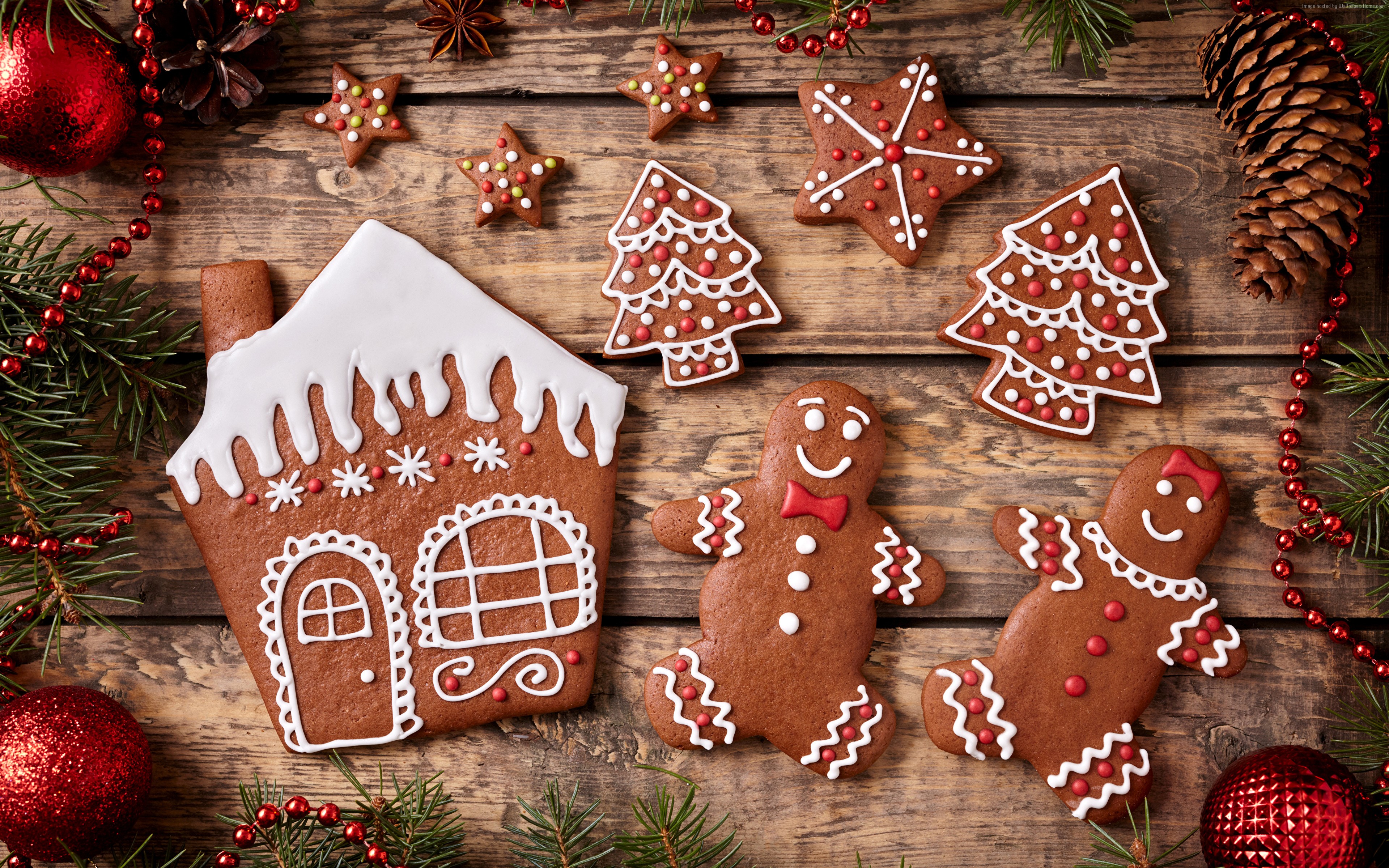 Christmas gingerbread cookies on wooden background HD Wallpaper