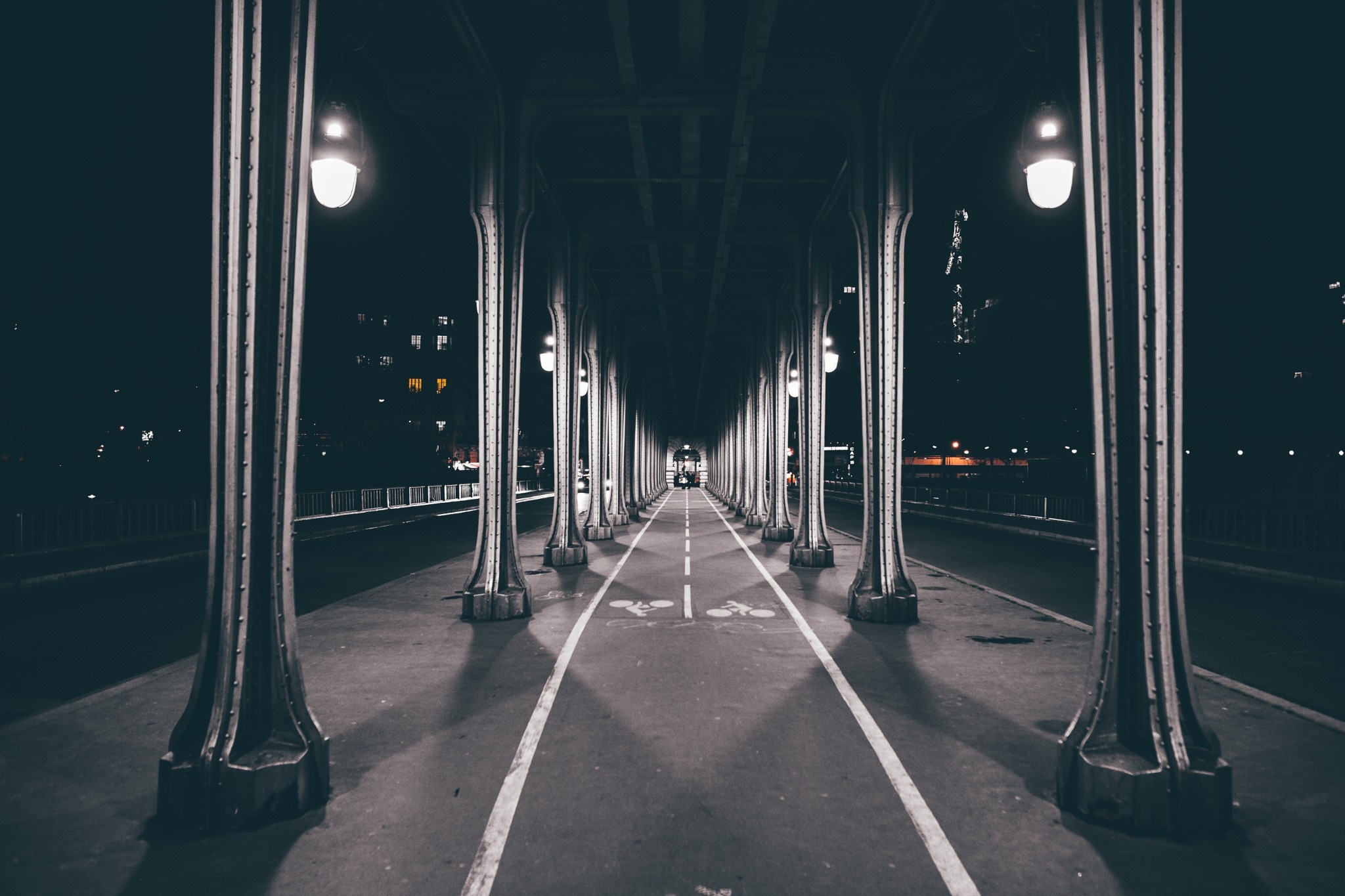 Night view of a bridge with lights and columns HD Wallpaper
