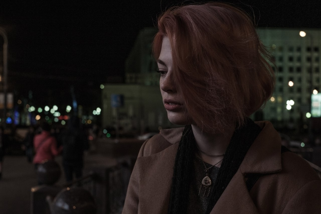Redhead woman looking away at night HD Wallpaper