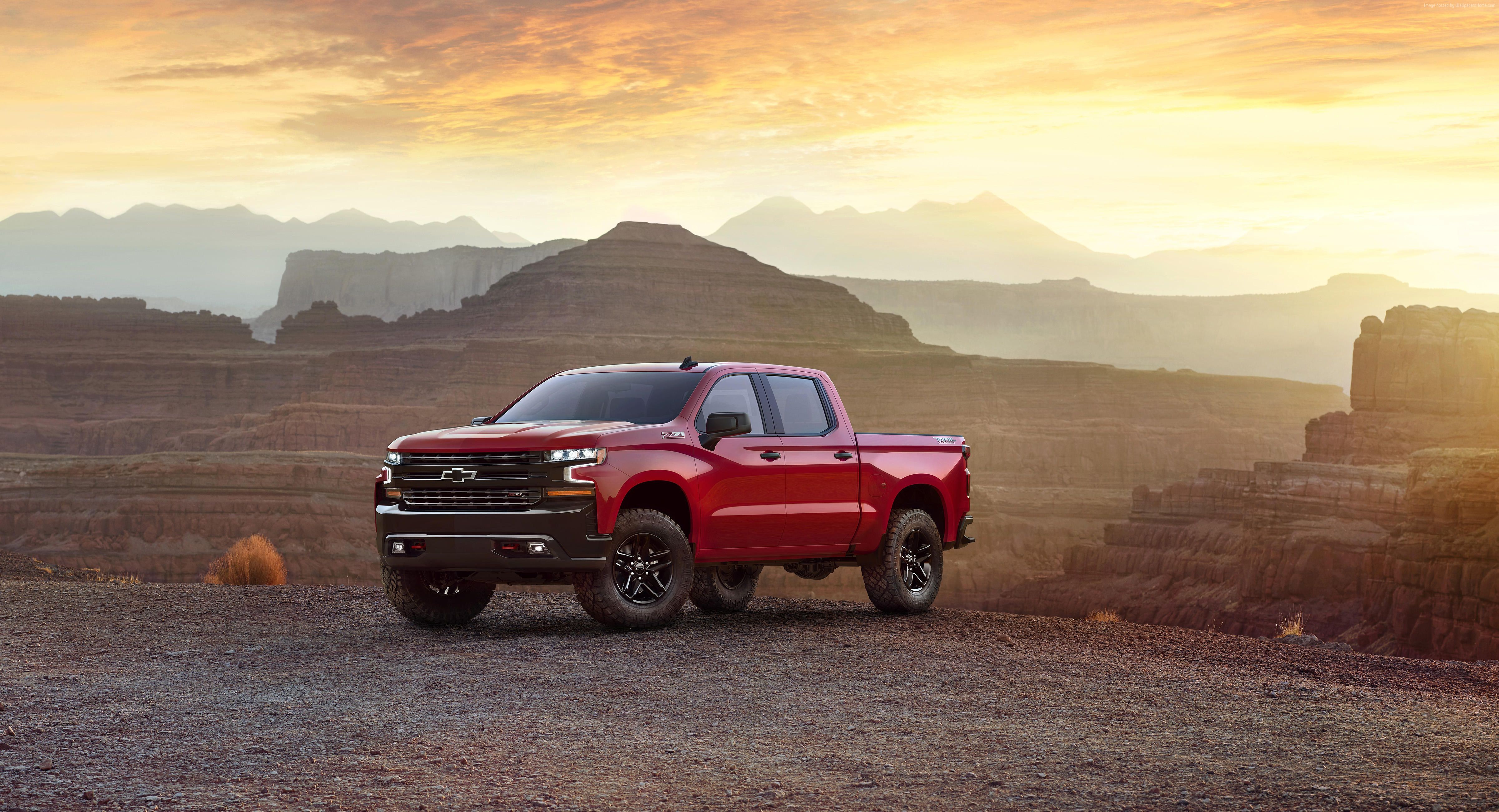 Red Chevrolet Silverado 4K in a canyon HD Wallpaper