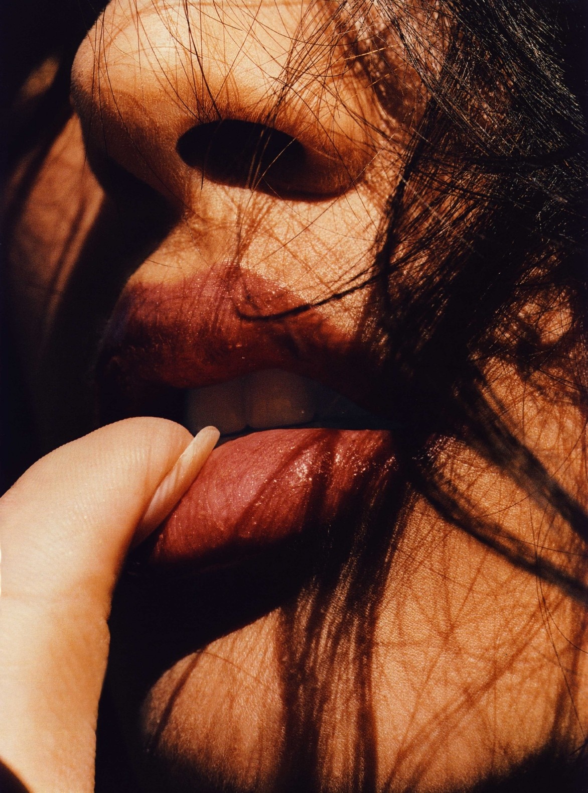 Close up of a woman's mouth with finger on lips HD Wallpaper