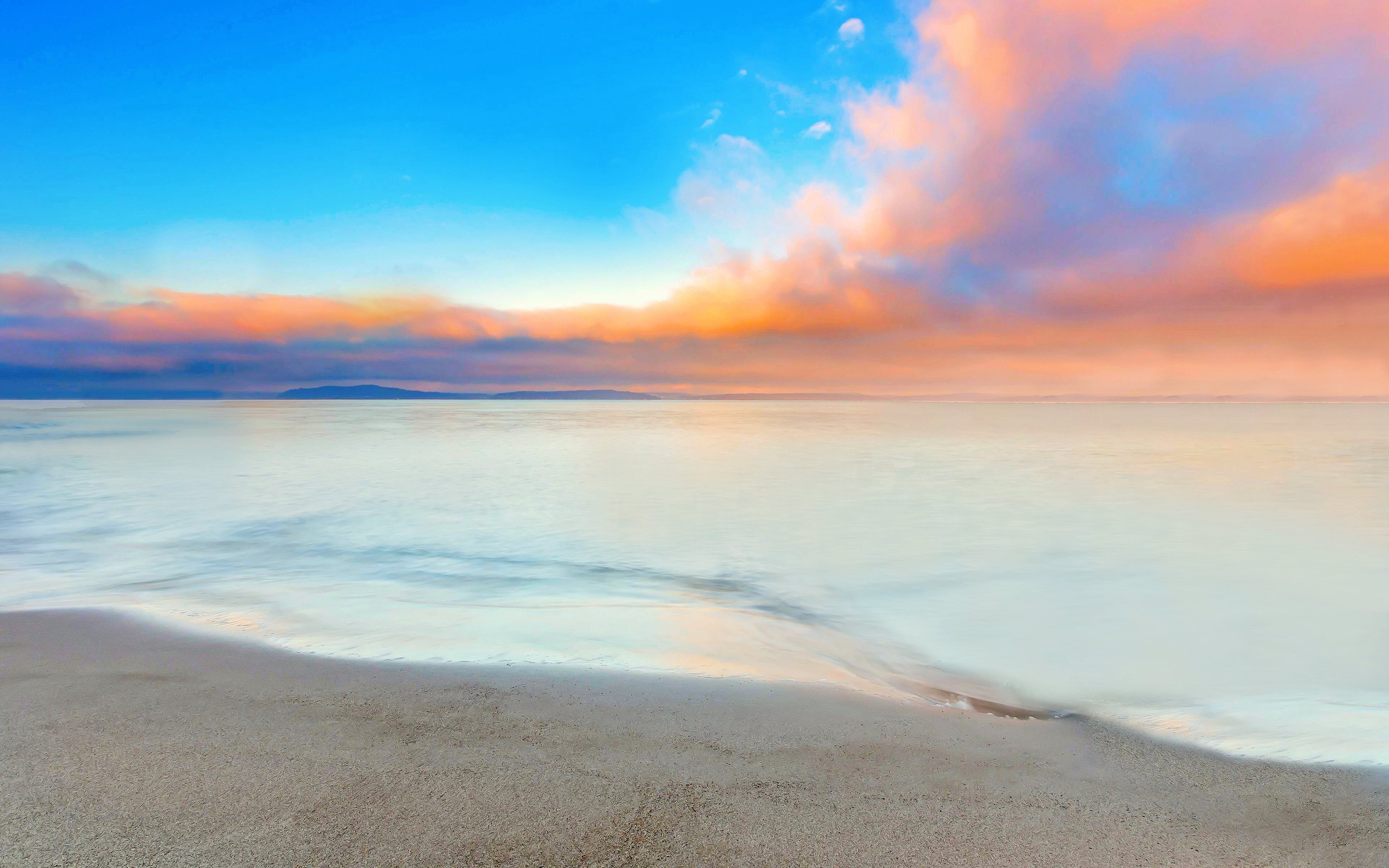 Ocean sunset with colorful clouds over the horizon HD Wallpaper