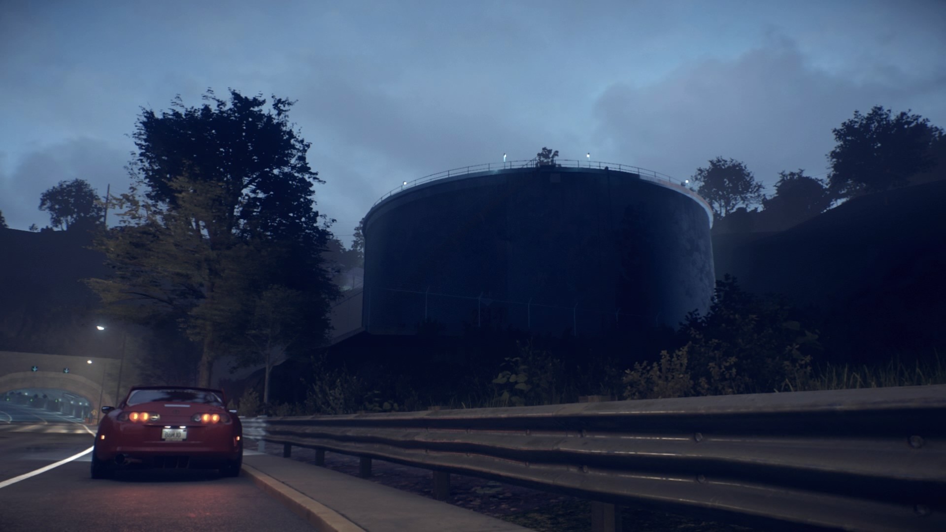 Red Toyota Supra on a highway at dusk HD Wallpaper