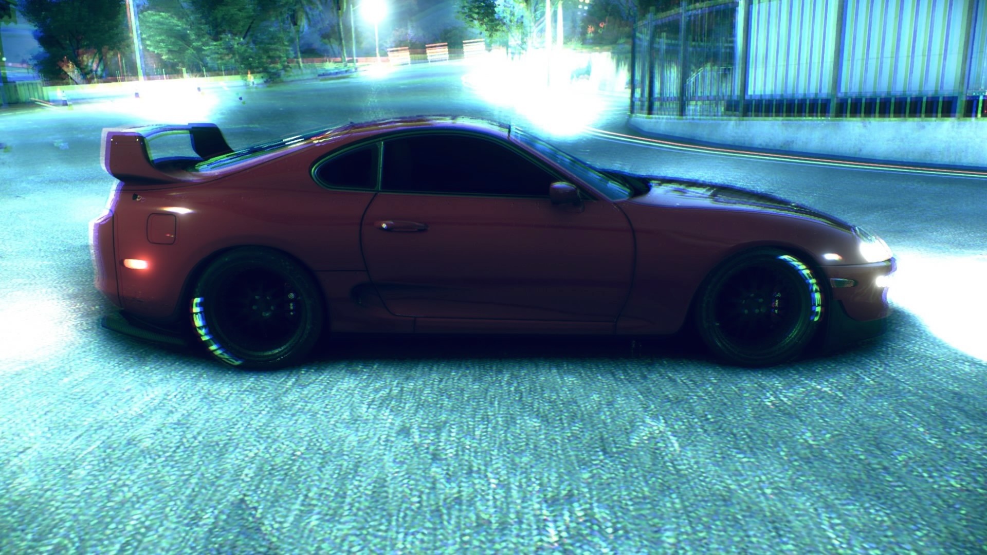 Red Toyota Supra sports car on a street HD Wallpaper