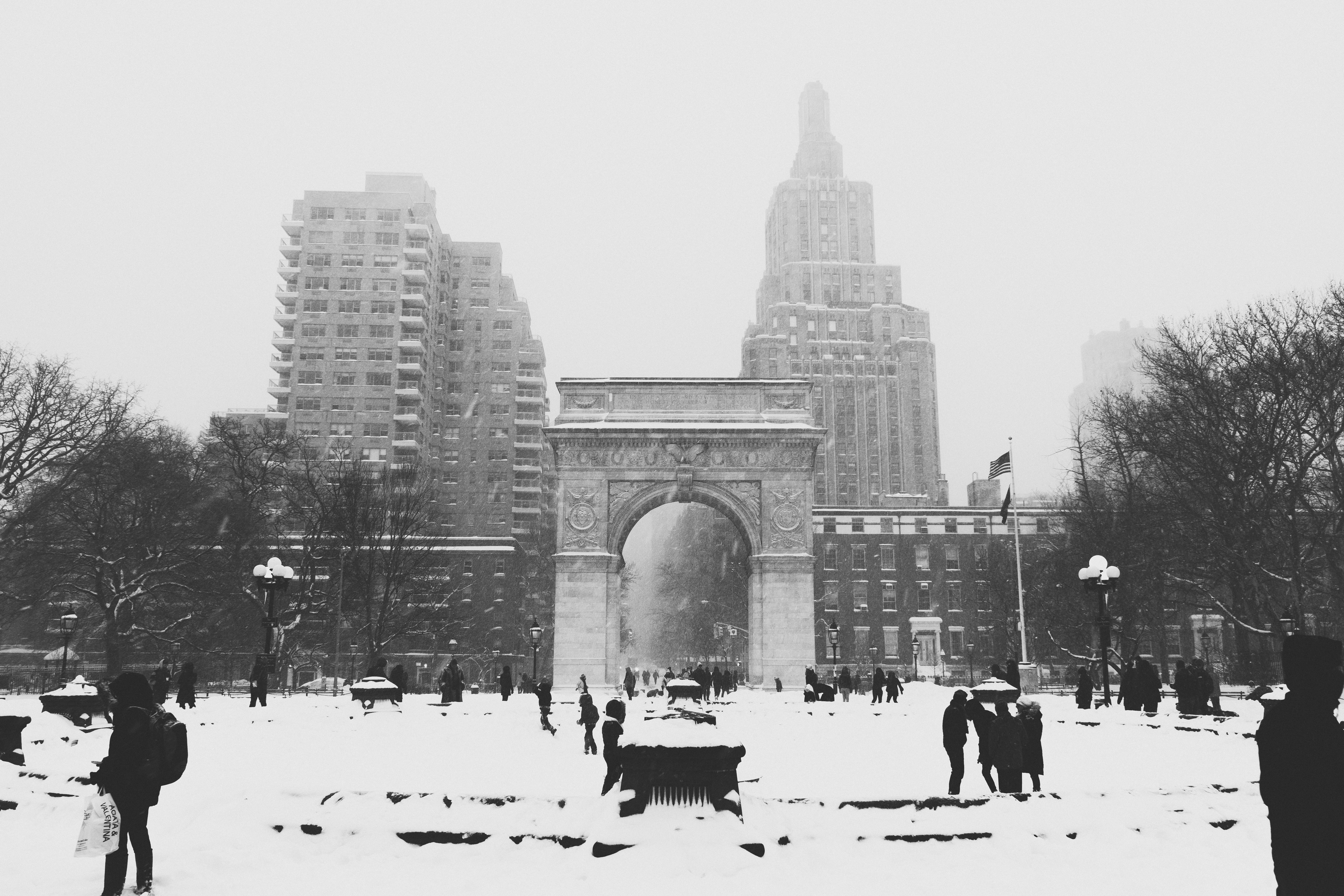 Washington Square Arch in New York City during winter snow HD Wallpaper