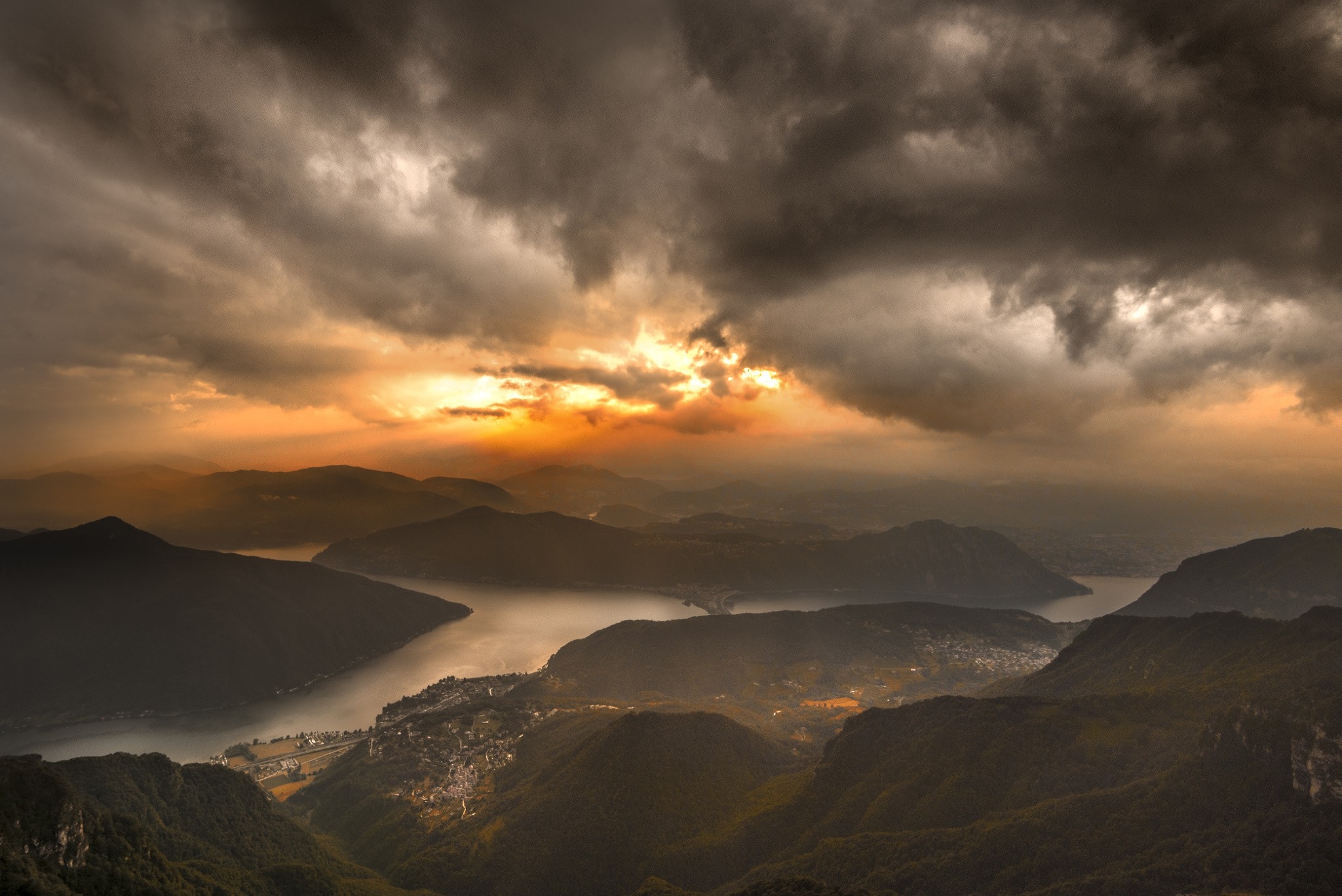 Dramatic sunset over mountains and lake HD Wallpaper