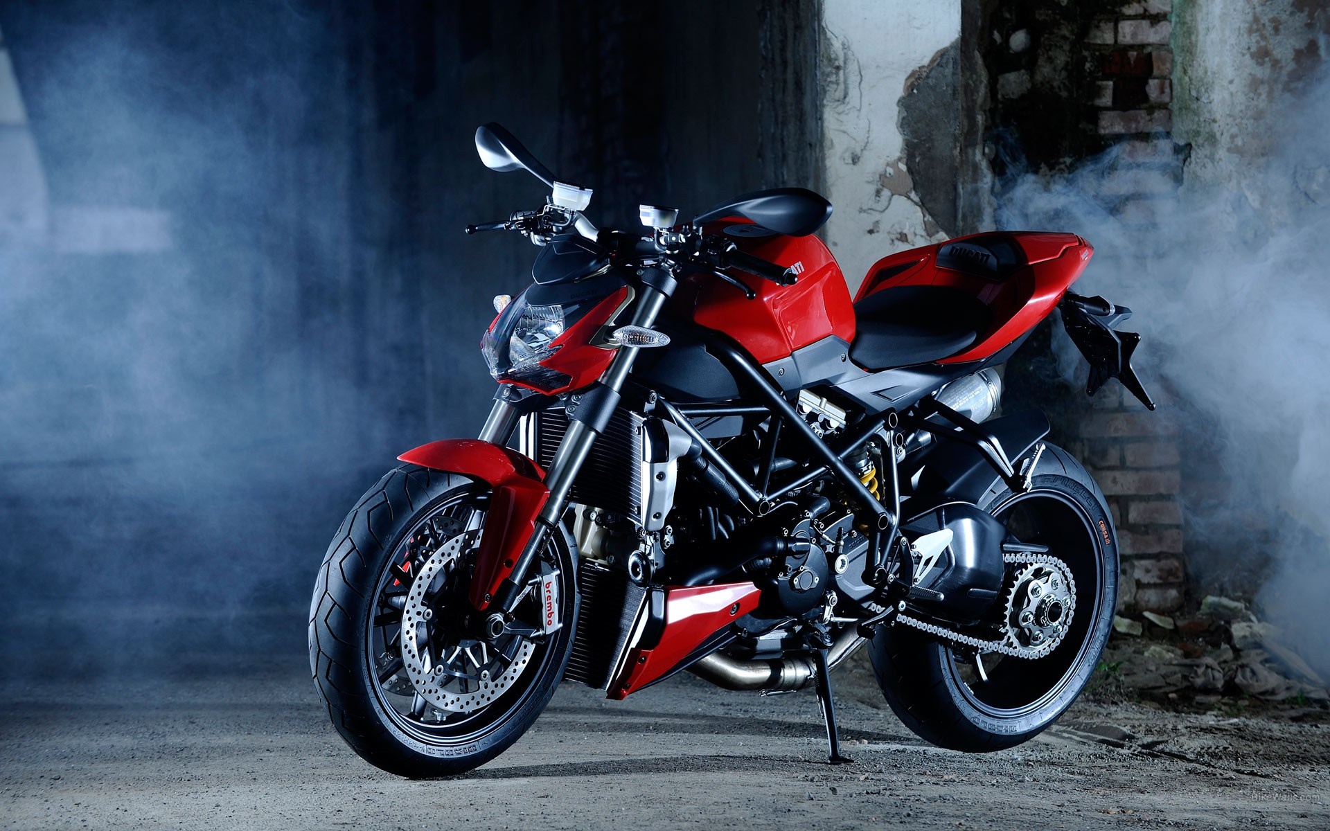 Red Ducati Motorcycle in Smoky Environment HD Wallpaper
