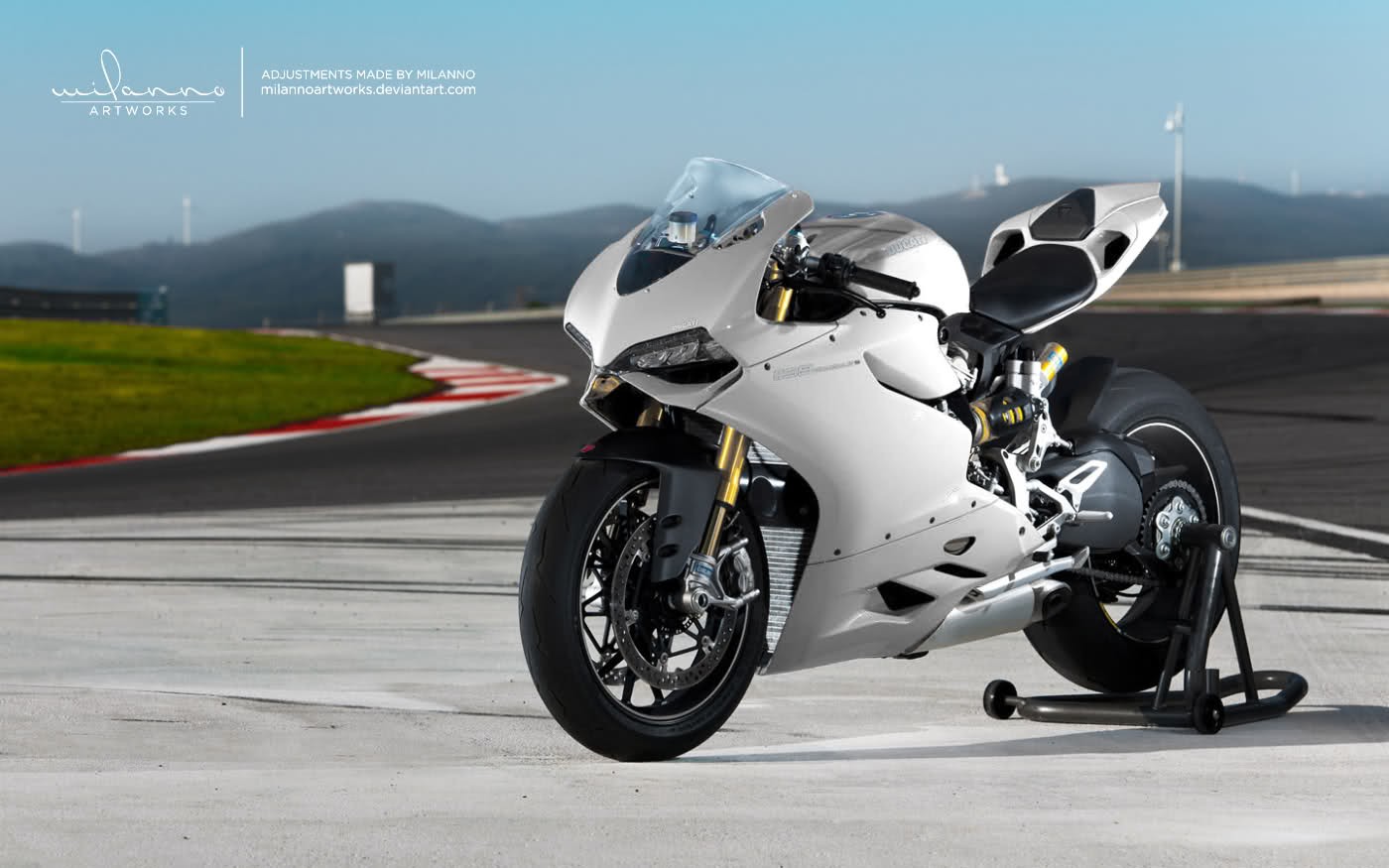 White Ducati Superbike on a Racetrack HD Wallpaper