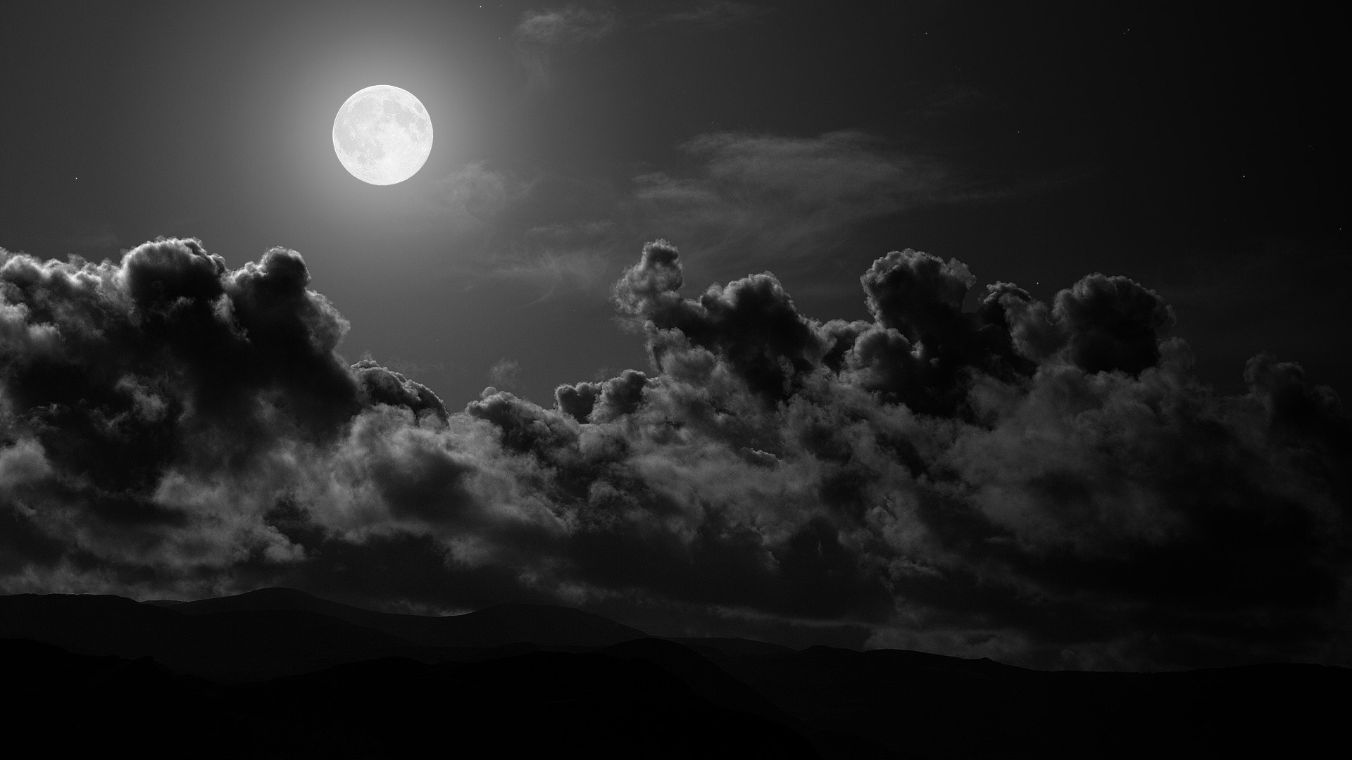 Full moon over dark clouds and hills HD Wallpaper