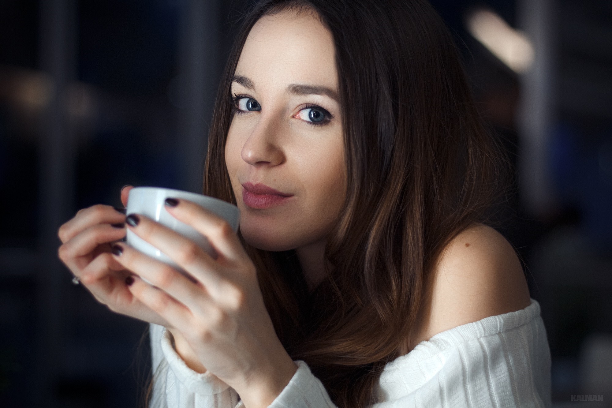 Woman holding a white mug, close-up portrait HD Wallpaper