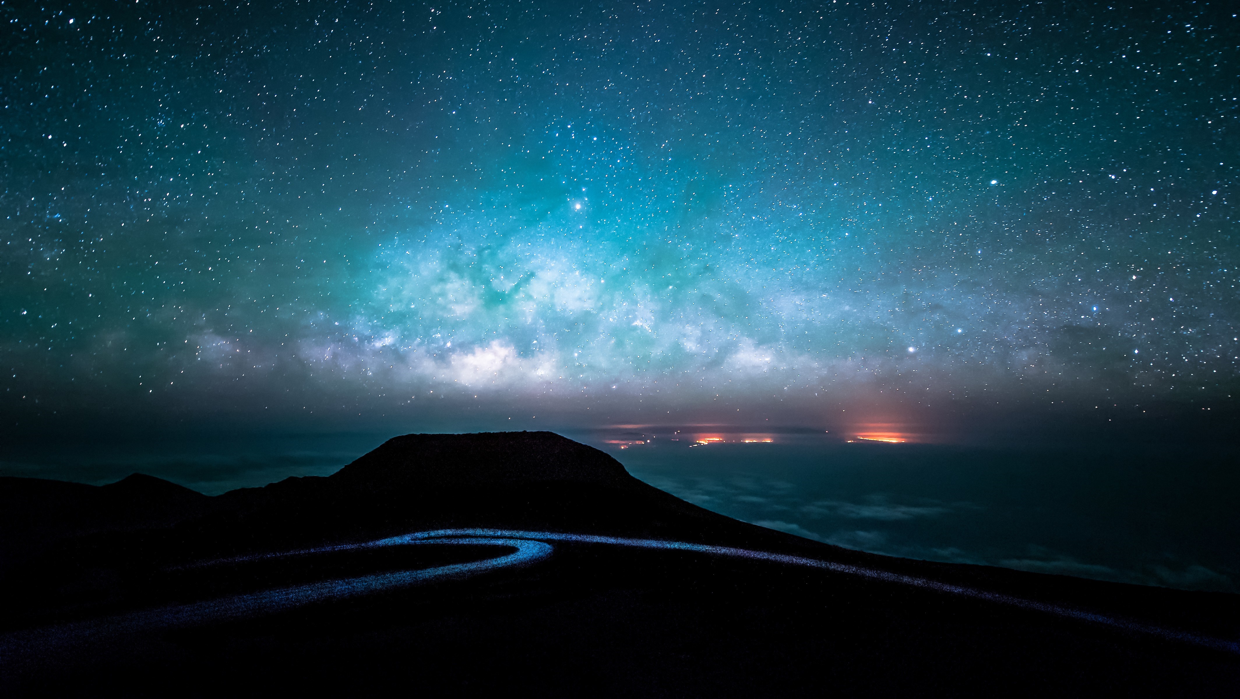Night sky with Milky Way over mountains and city lights HD Wallpaper