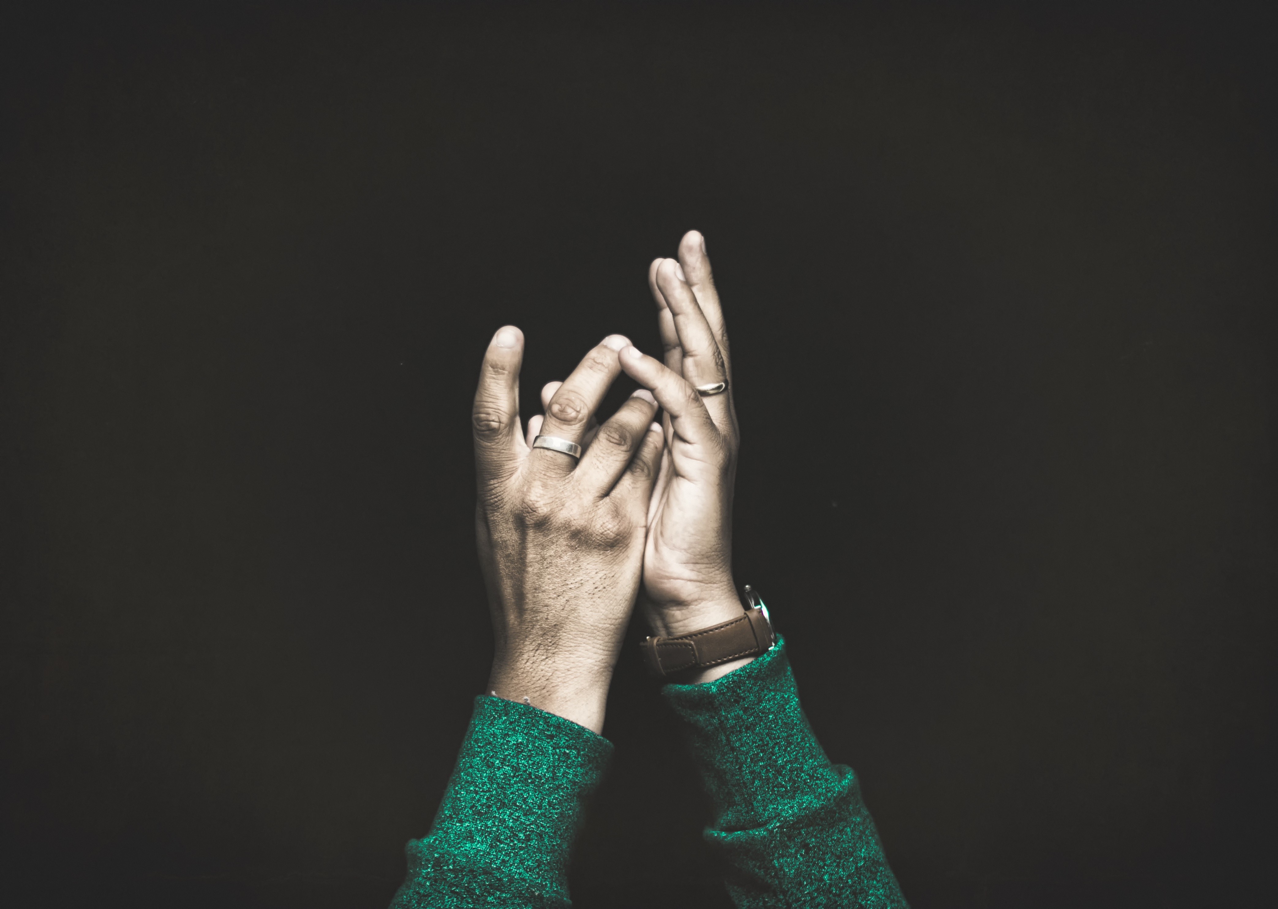 Close up of man's hands wearing rings and watch HD Wallpaper