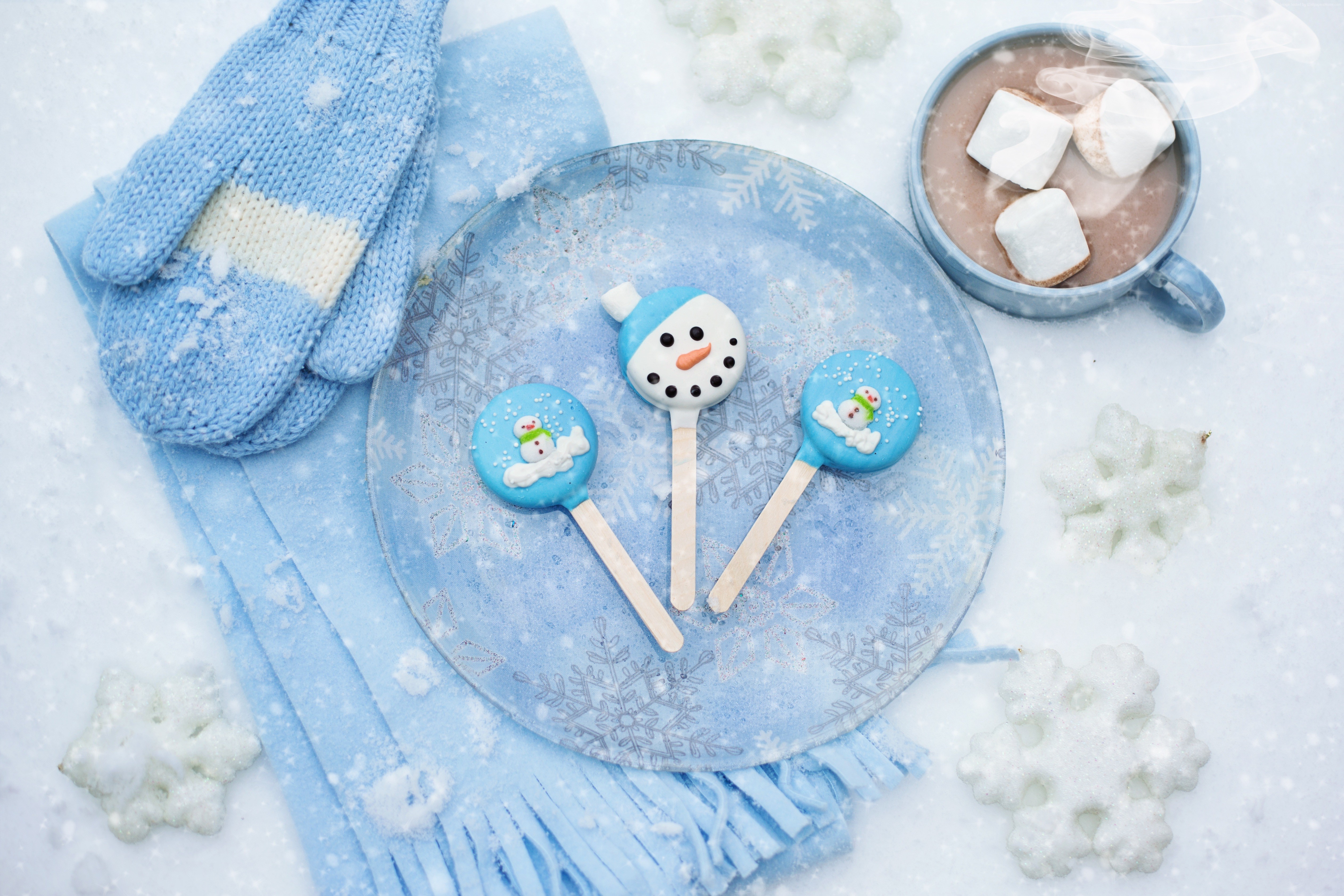Winter scene with hot chocolate and snowman candies HD Wallpaper