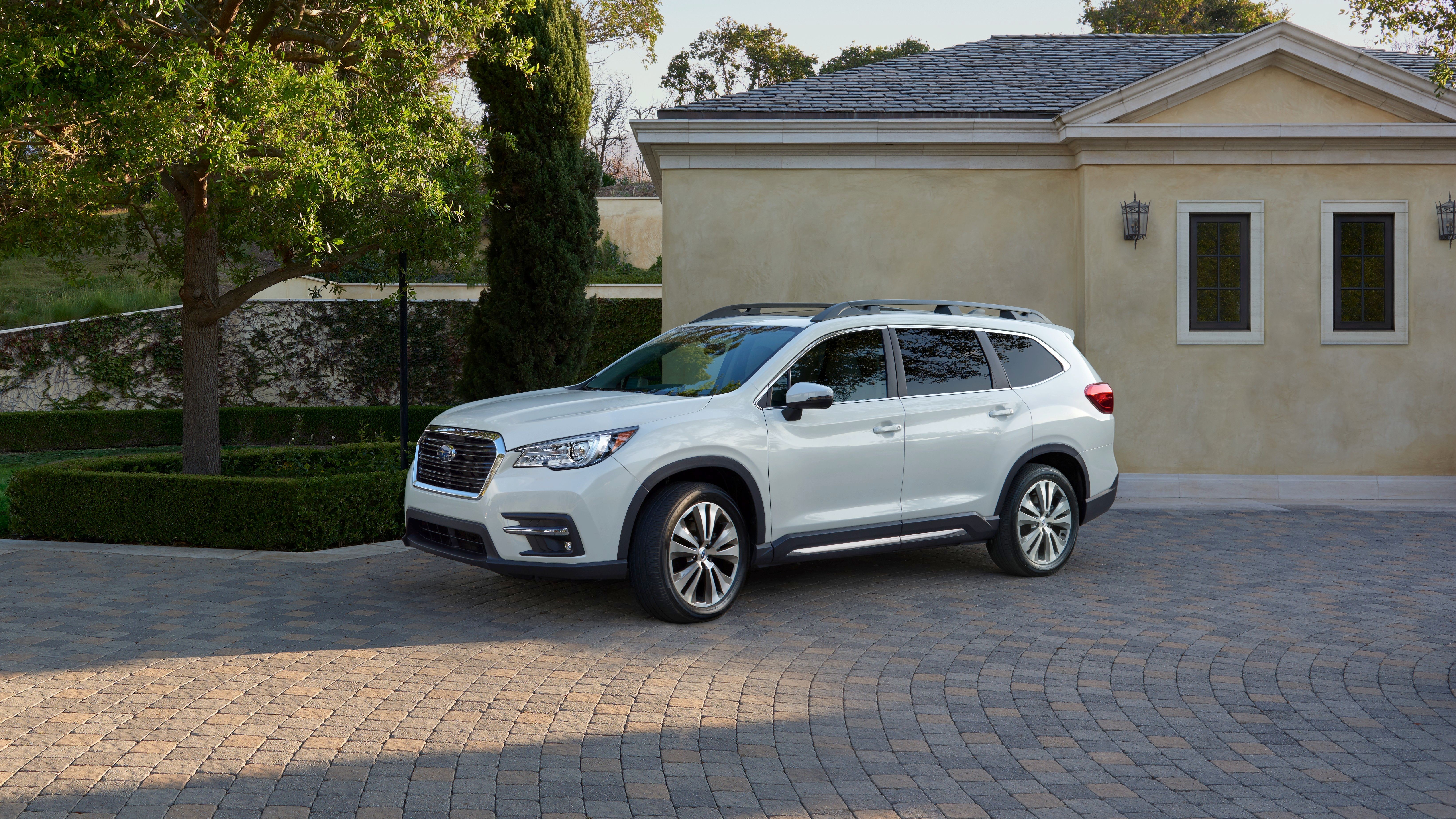 White Subaru Ascent parked in driveway HD Wallpaper