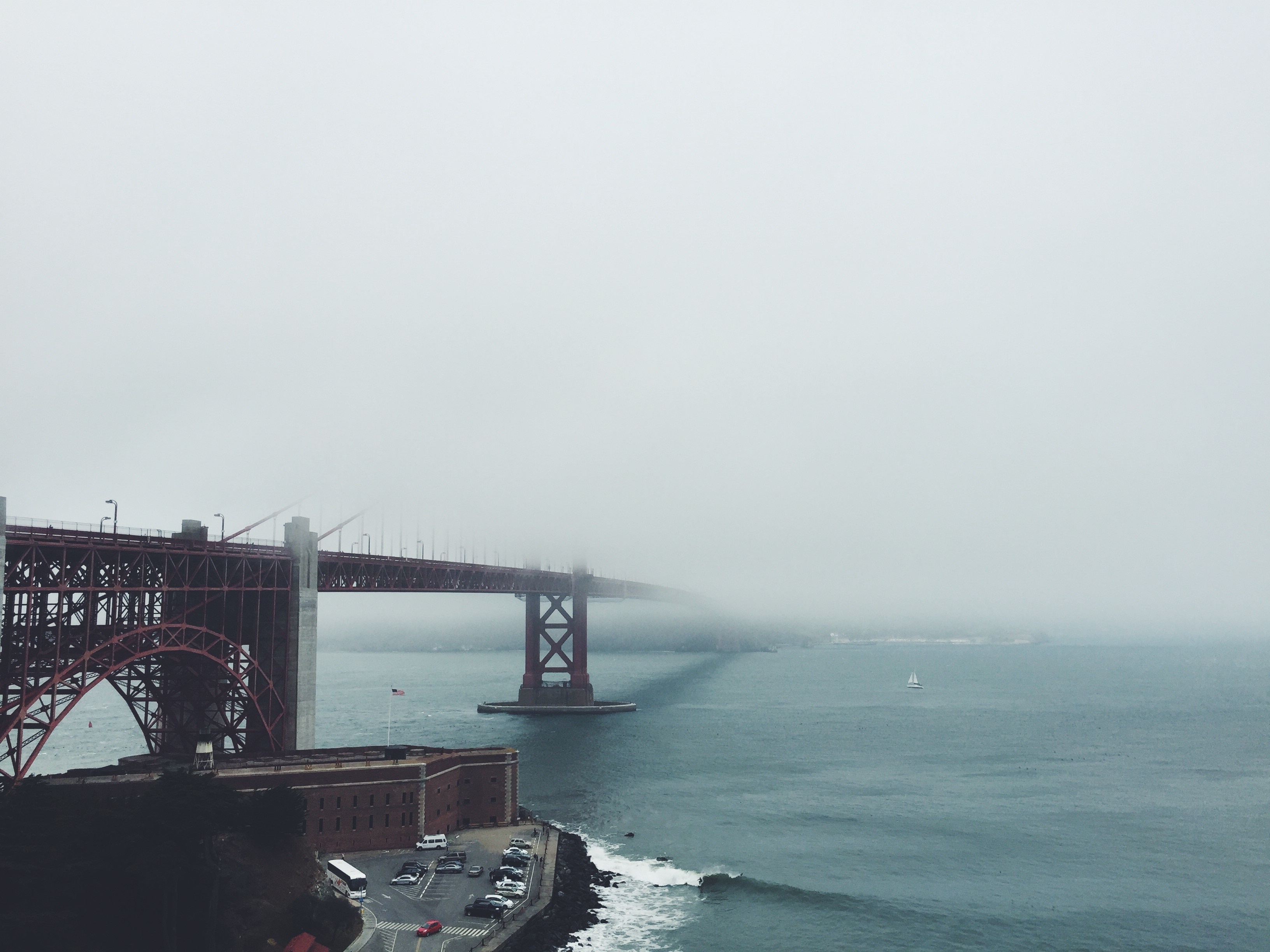 Golden Gate Bridge in Fog Over Water HD Wallpaper
