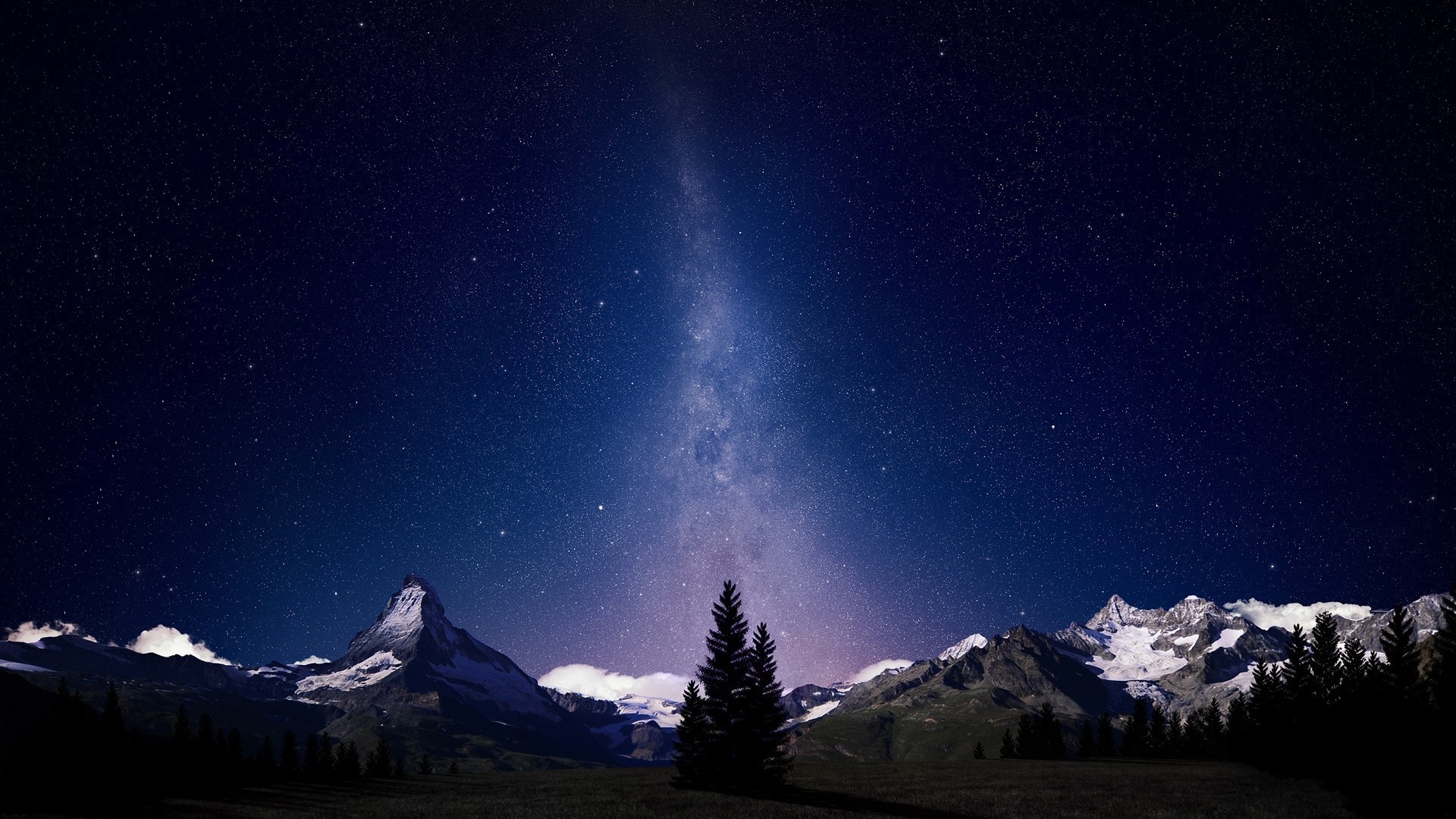 Milky Way over snow-capped mountains and pine trees HD Wallpaper