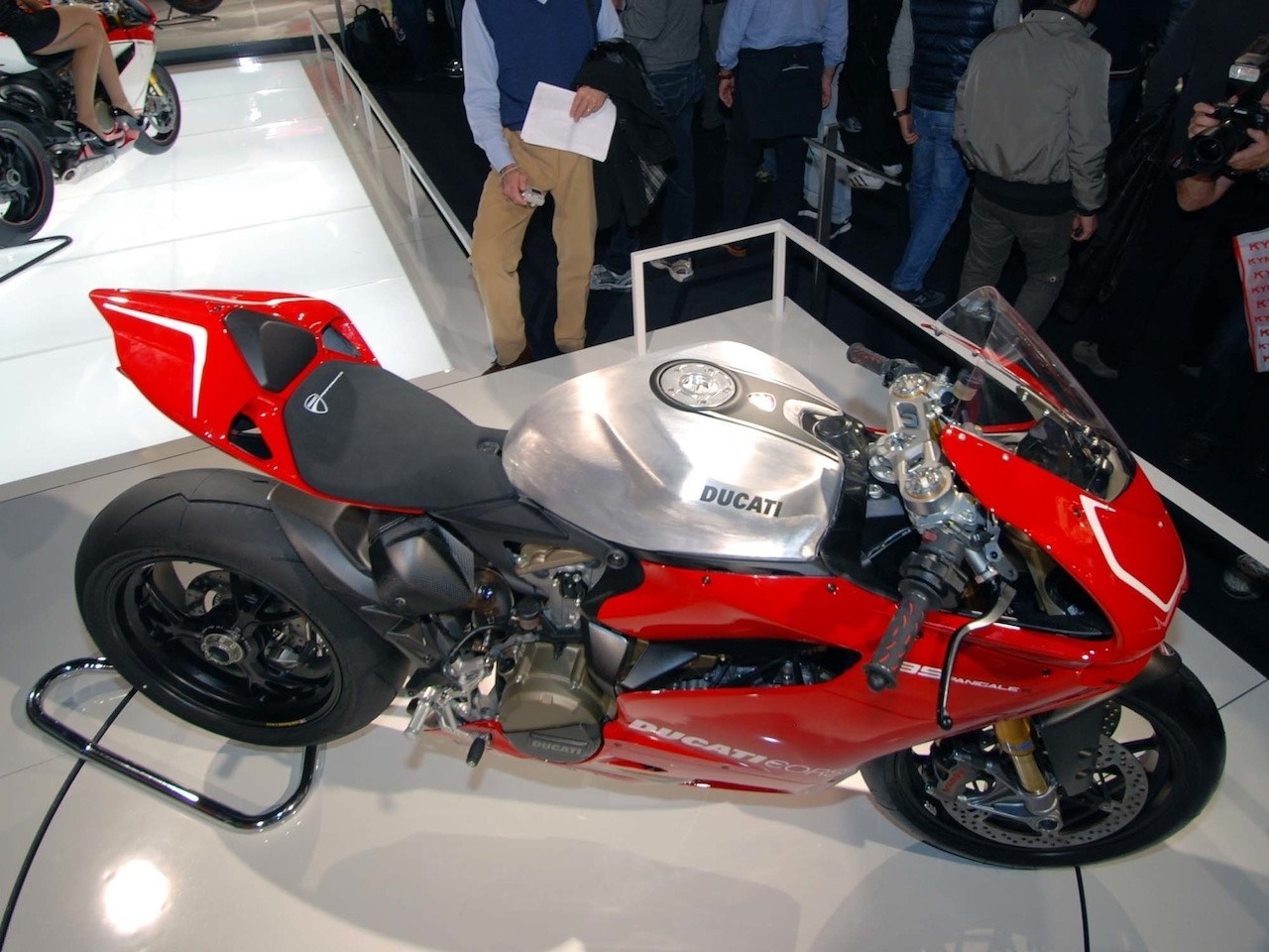 Red Ducati motorcycle with silver fuel tank HD Wallpaper
