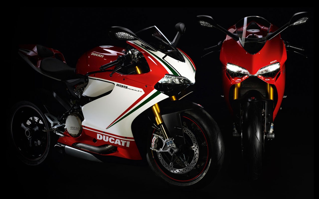 Two Ducati 1199 Panigale S motorcycles on a black background HD Wallpaper