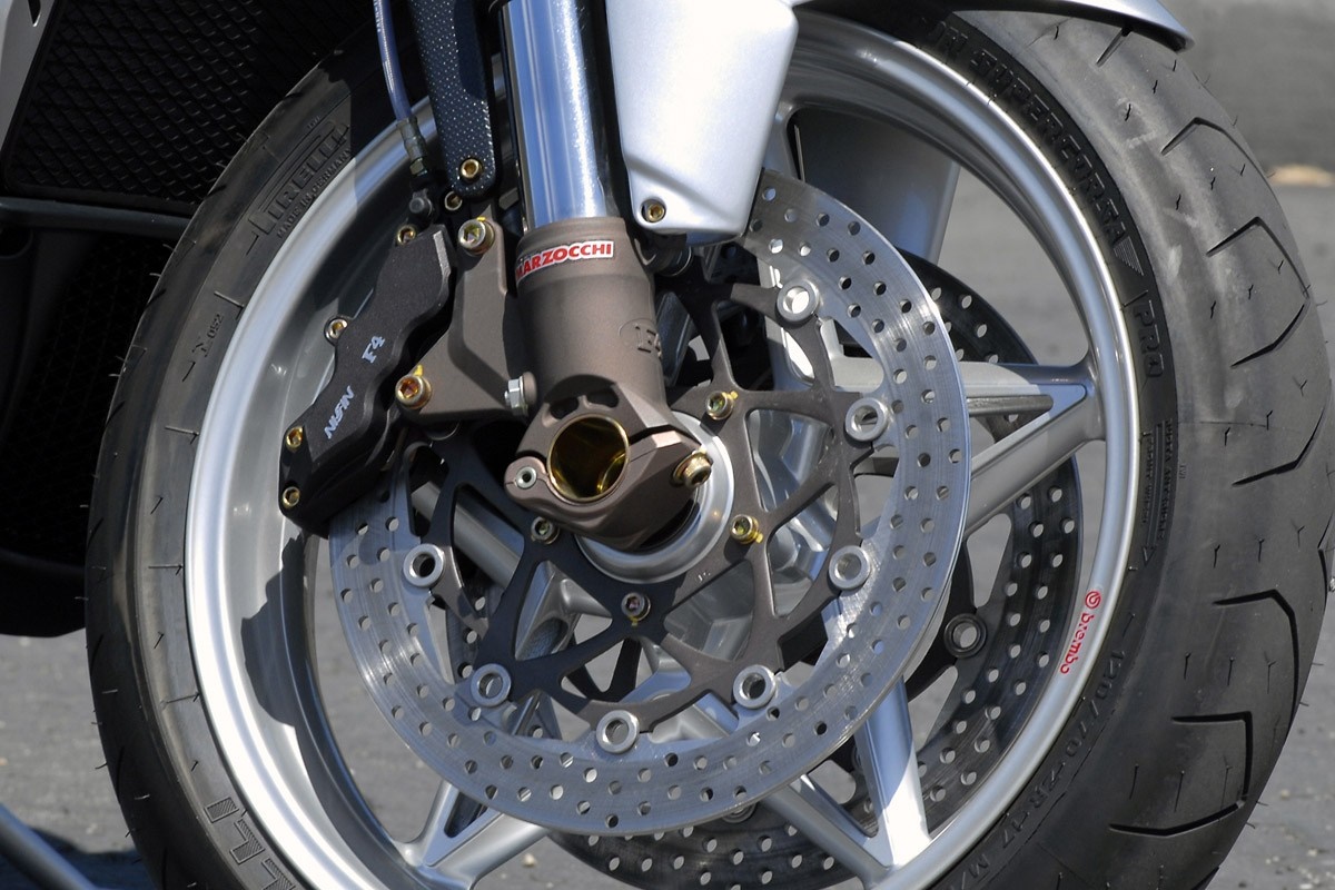 Motorcycle front wheel with Marzocchi forks and Brembo brakes HD Wallpaper