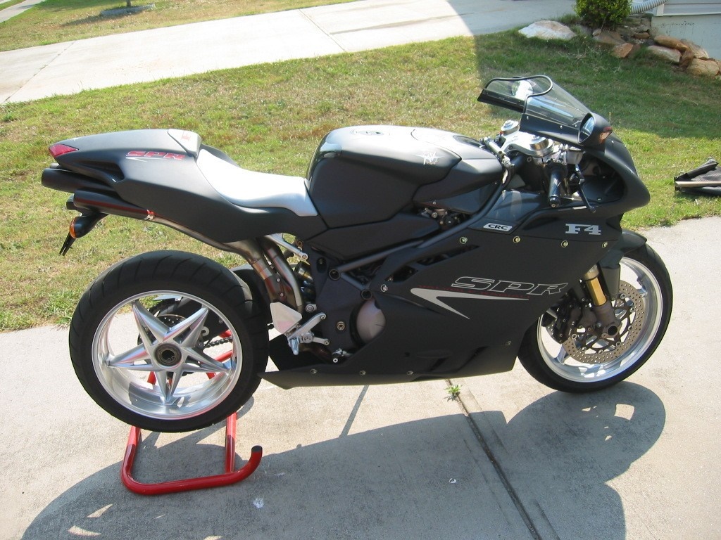 MV Agusta F4 SPR motorcycle on a red stand HD Wallpaper