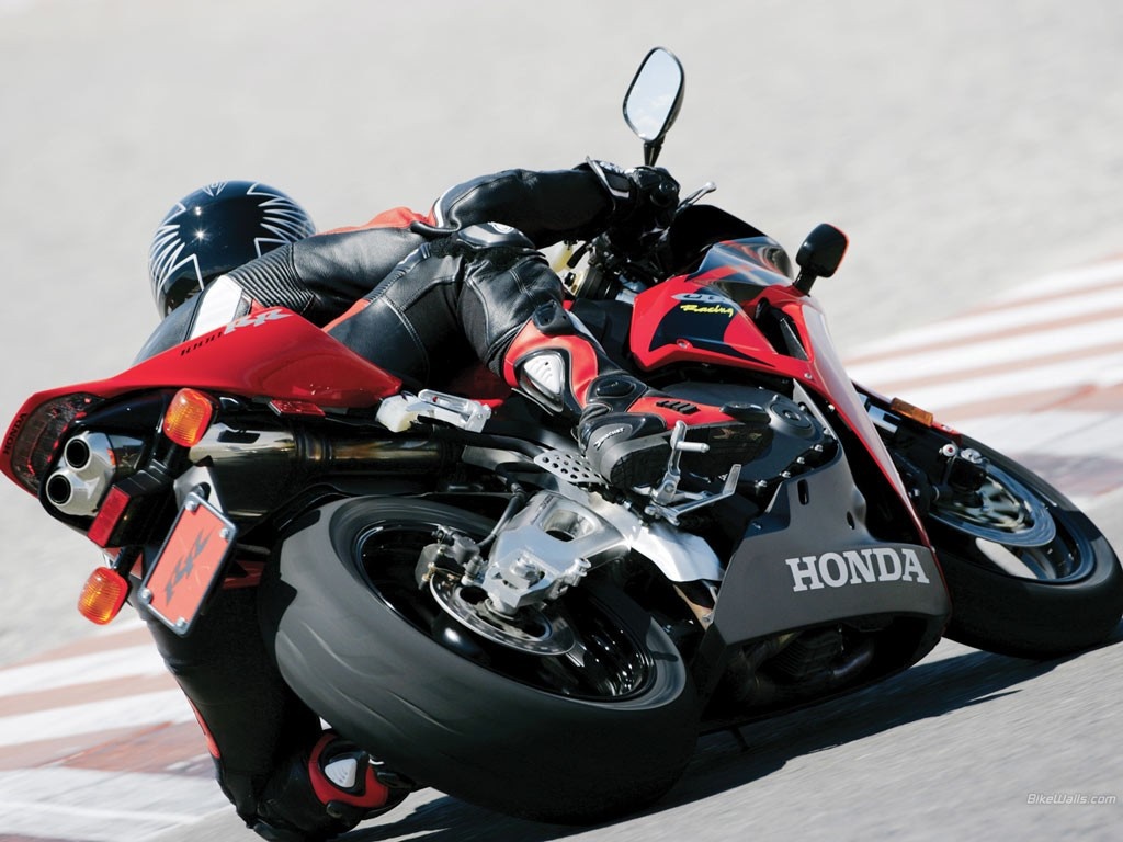 Honda motorcycle on a race track HD Wallpaper