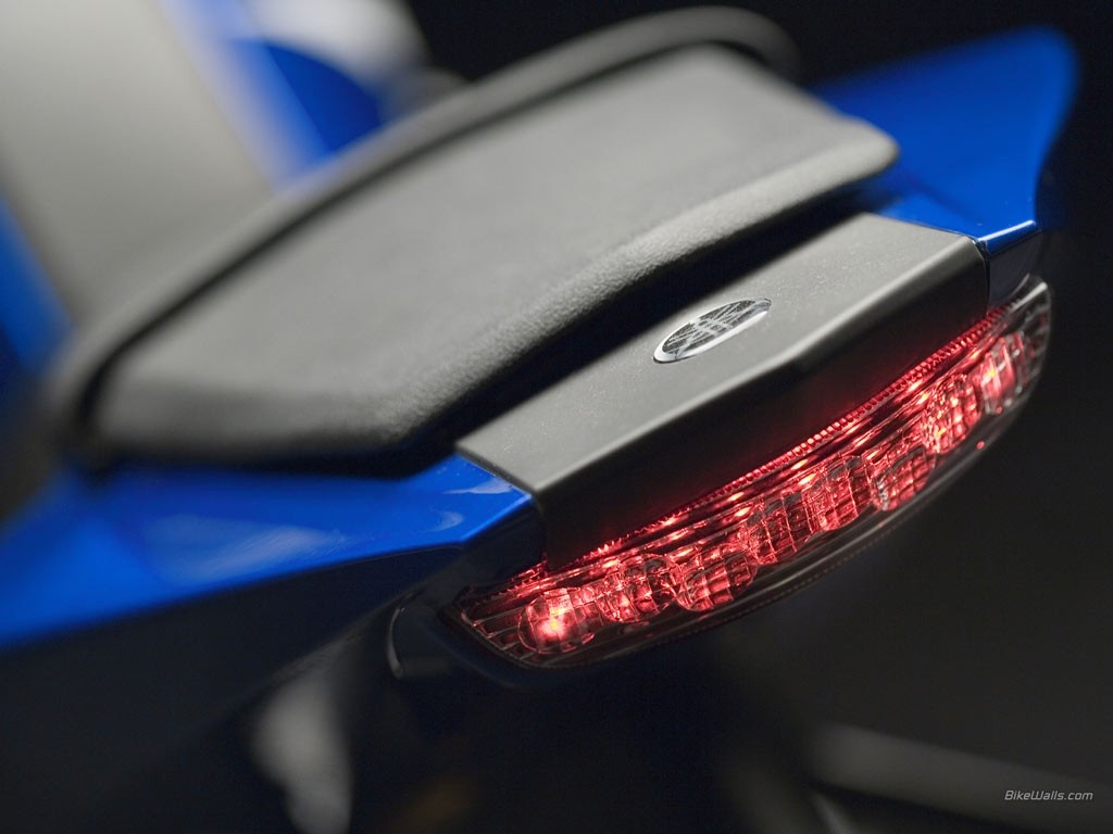 Close-up of a blue Yamaha R6 motorcycle tail light HD Wallpaper