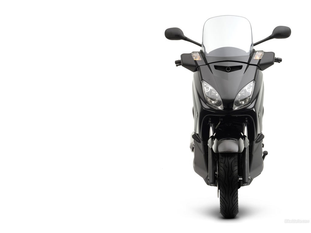 Front view of a black Yamaha T-Max scooter HD Wallpaper